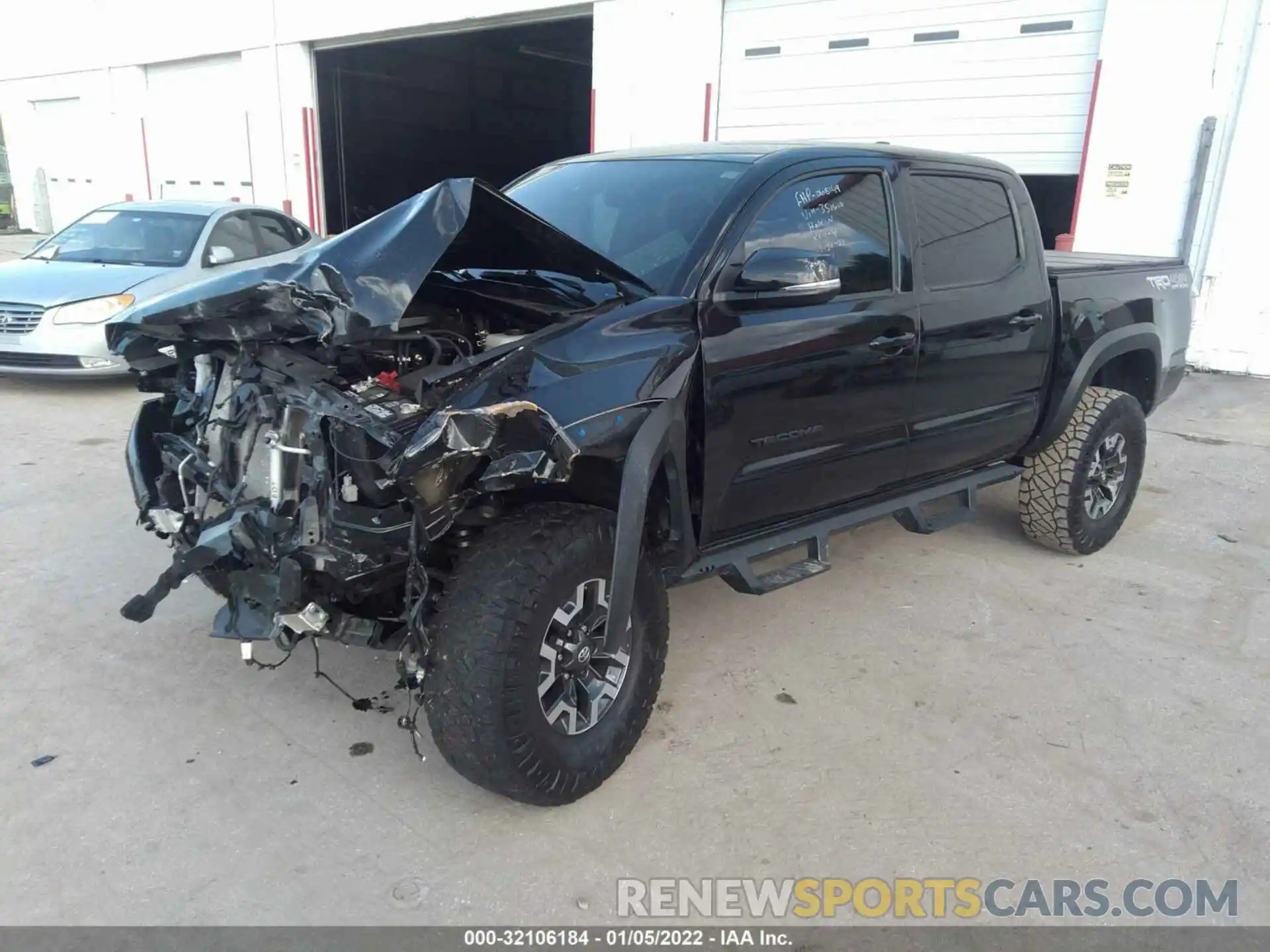 2 Photograph of a damaged car 3TMCZ5AN5LM350610 TOYOTA TACOMA 4WD 2020