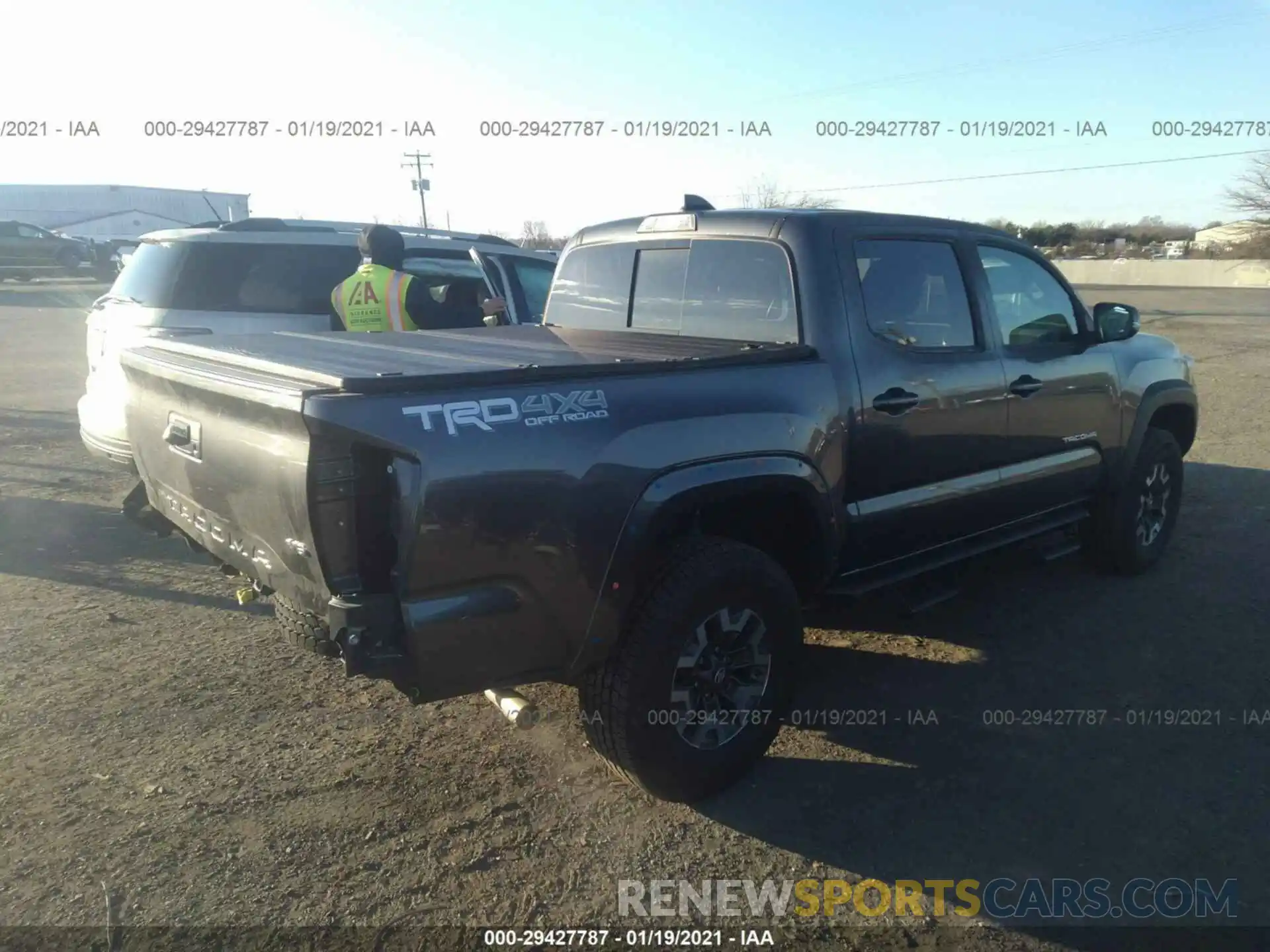 4 Photograph of a damaged car 3TMCZ5AN6LM313761 TOYOTA TACOMA 4WD 2020