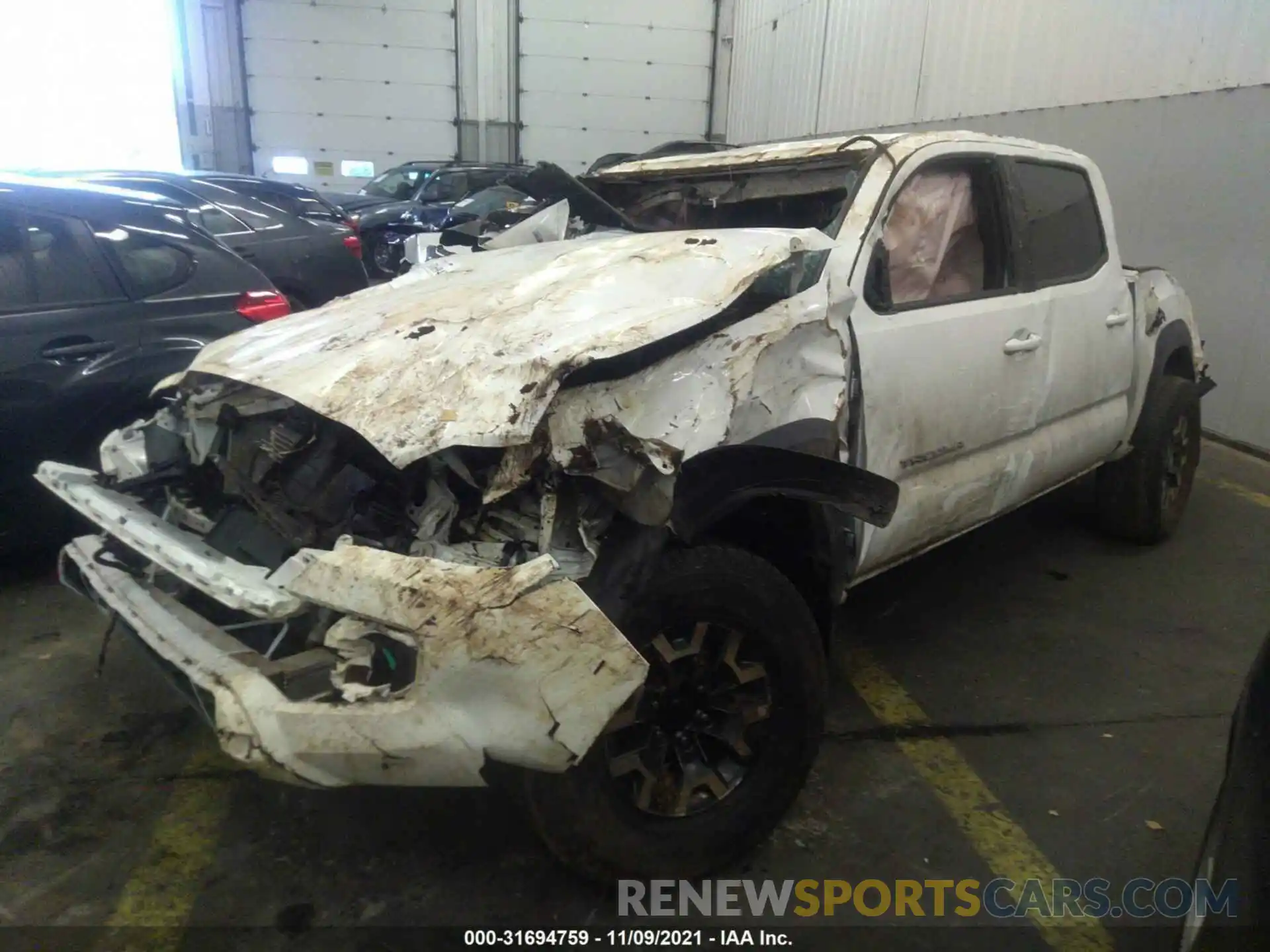 2 Photograph of a damaged car 3TMCZ5AN6LM318457 TOYOTA TACOMA 4WD 2020