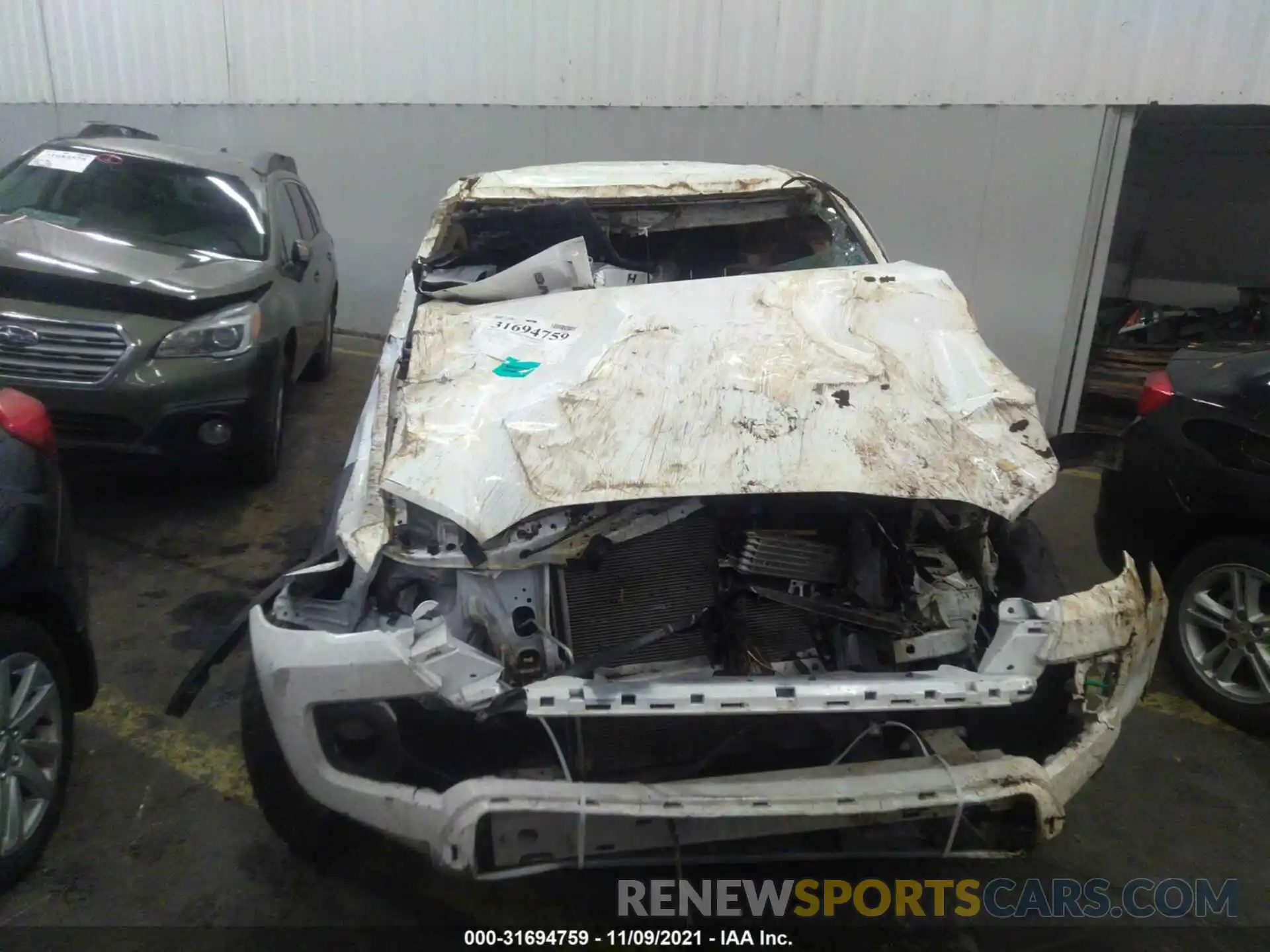 6 Photograph of a damaged car 3TMCZ5AN6LM318457 TOYOTA TACOMA 4WD 2020