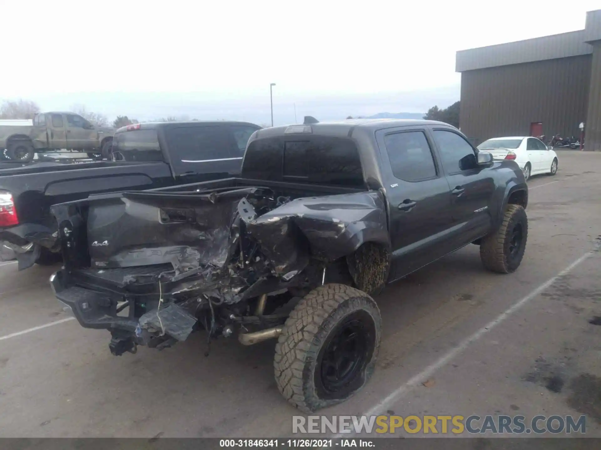 4 Photograph of a damaged car 3TMCZ5AN6LM324081 TOYOTA TACOMA 4WD 2020