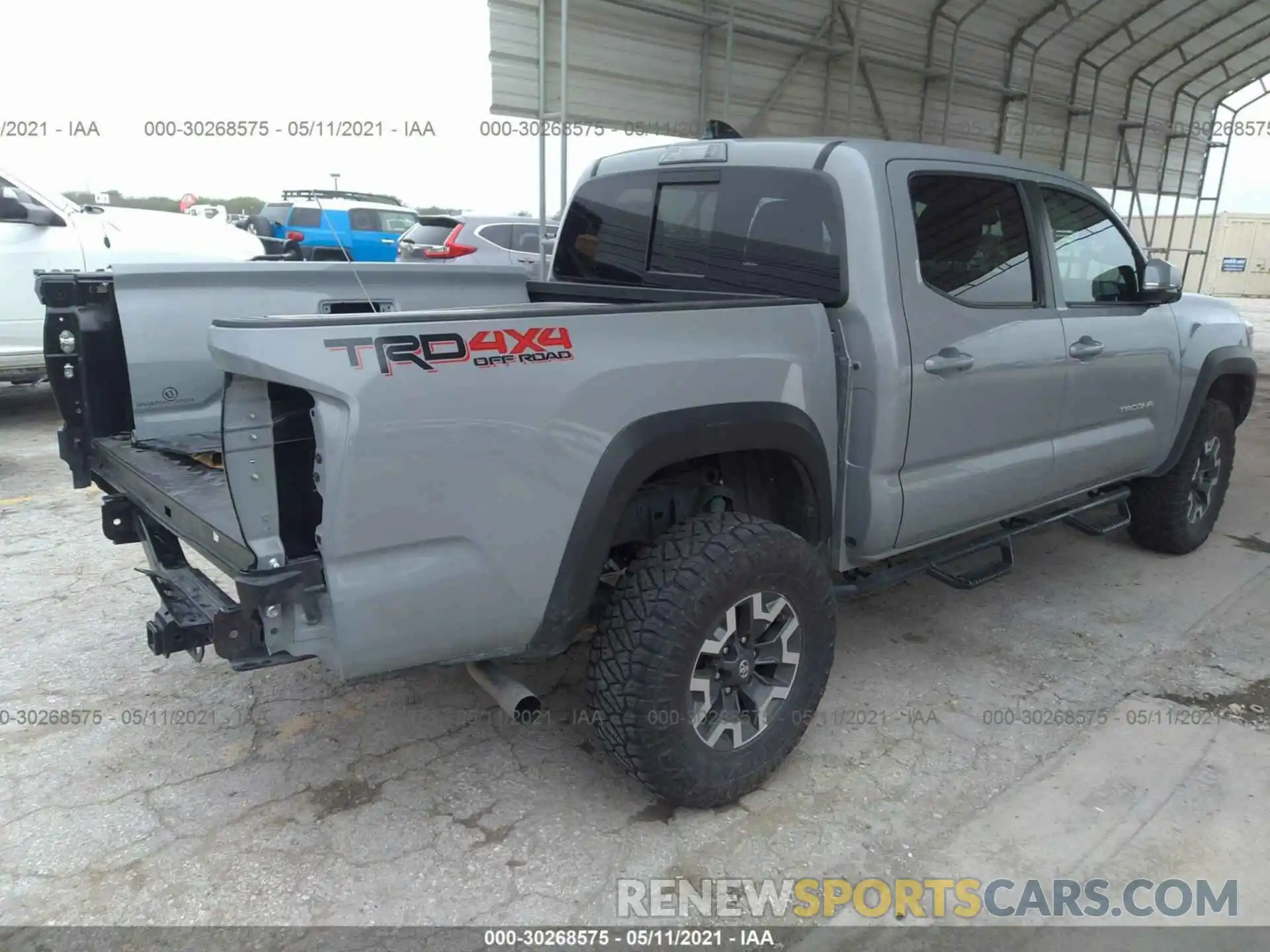 4 Photograph of a damaged car 3TMCZ5AN6LM337834 TOYOTA TACOMA 4WD 2020