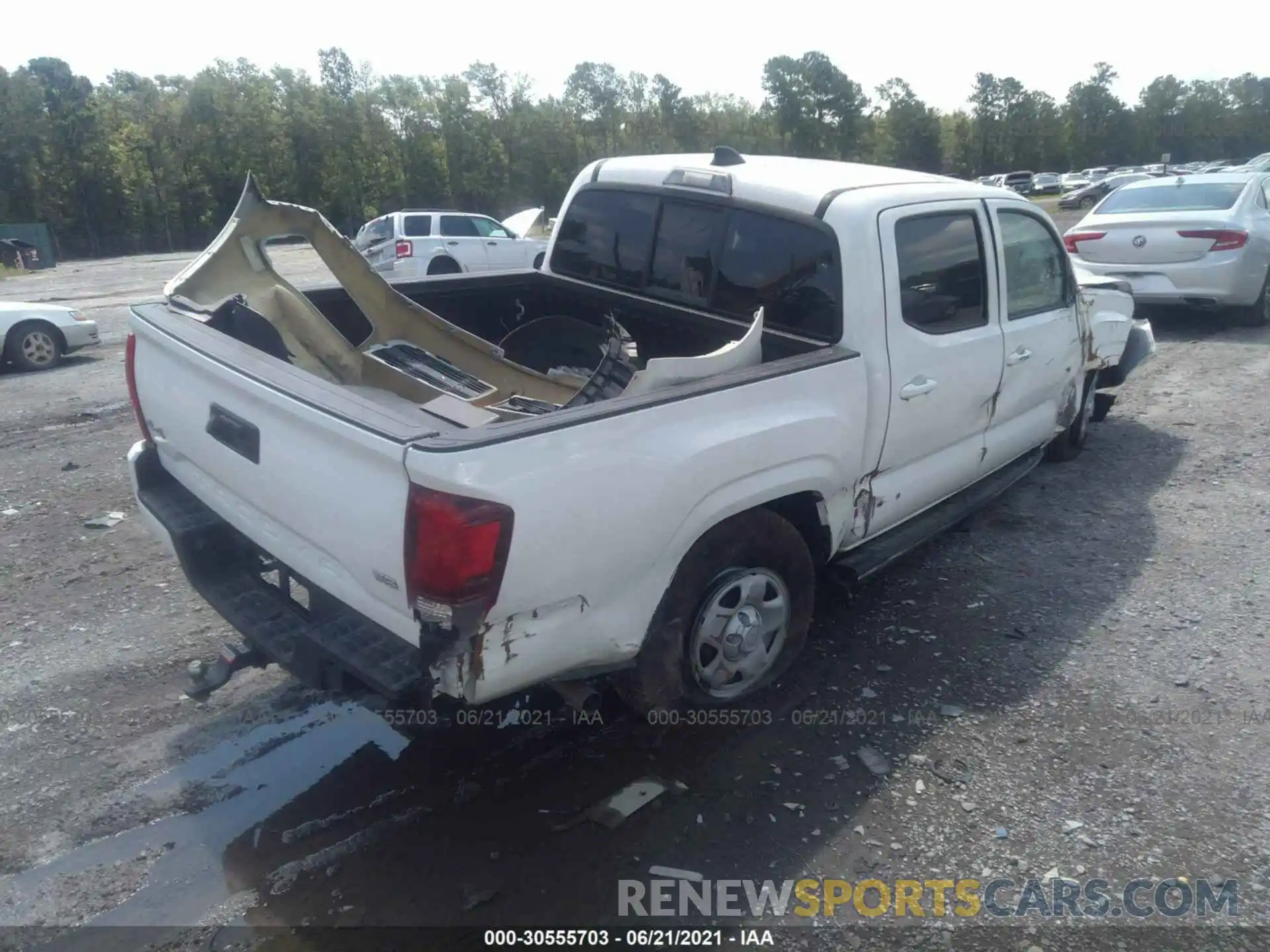 4 Photograph of a damaged car 3TMCZ5AN7LM301568 TOYOTA TACOMA 4WD 2020