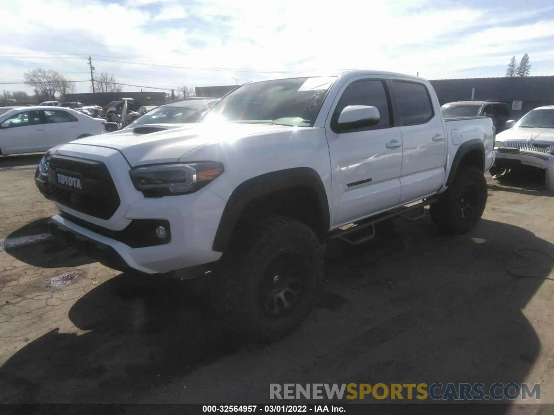 2 Photograph of a damaged car 3TMCZ5AN7LM309332 TOYOTA TACOMA 4WD 2020