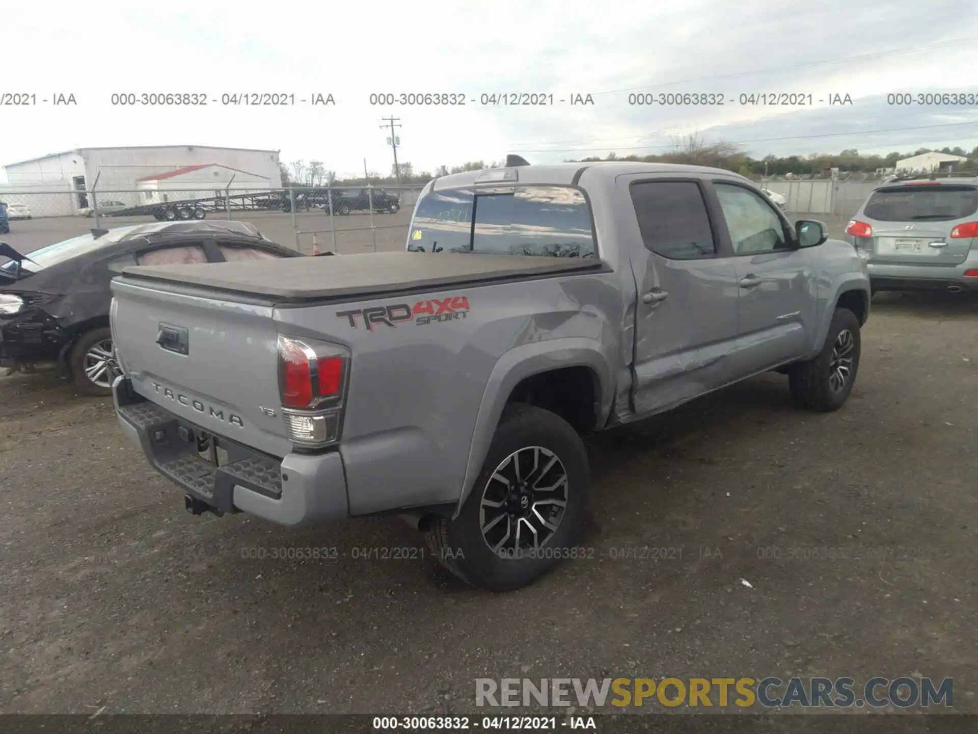 4 Photograph of a damaged car 3TMCZ5AN7LM311694 TOYOTA TACOMA 4WD 2020