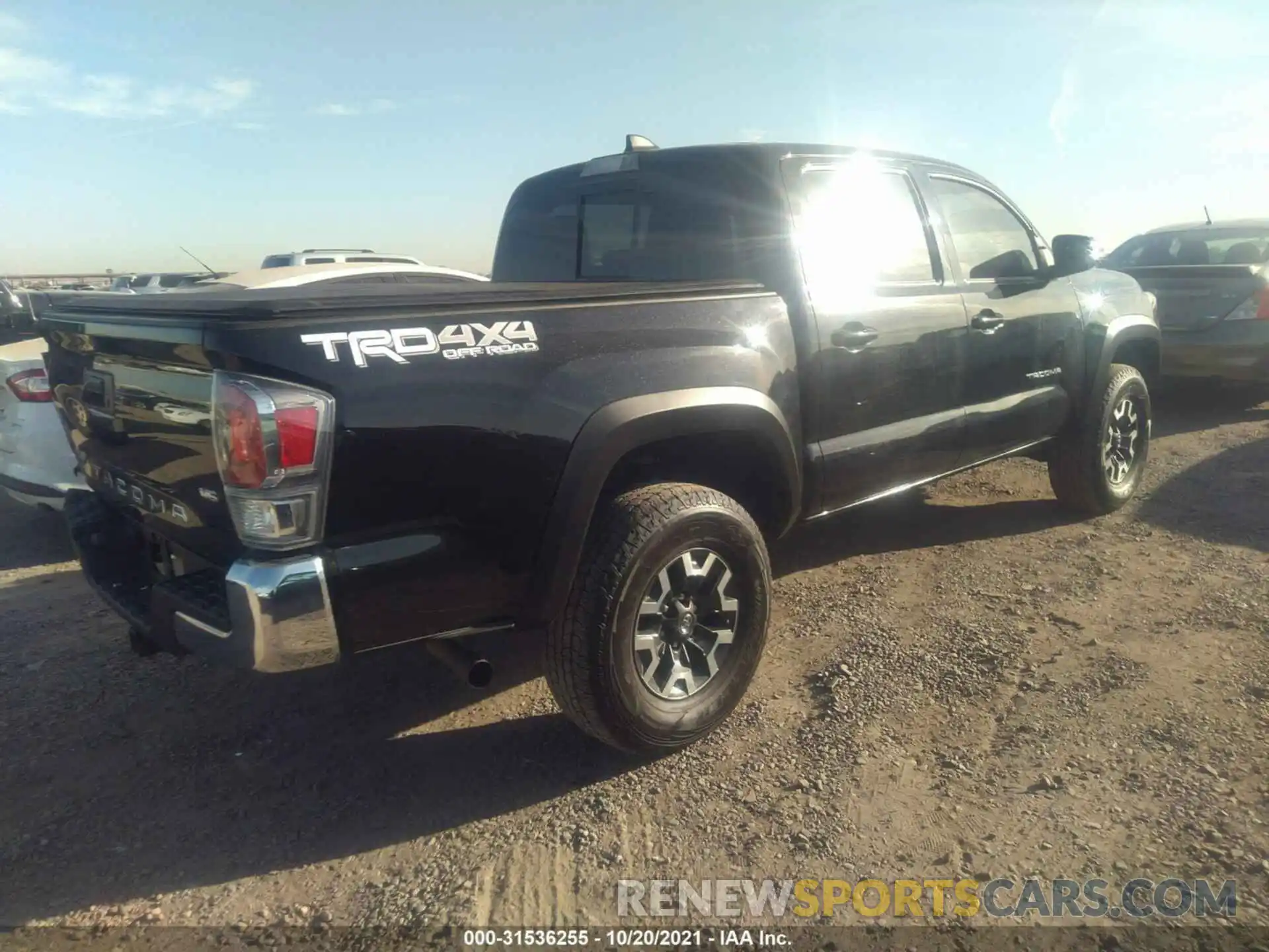 4 Photograph of a damaged car 3TMCZ5AN7LM316278 TOYOTA TACOMA 4WD 2020