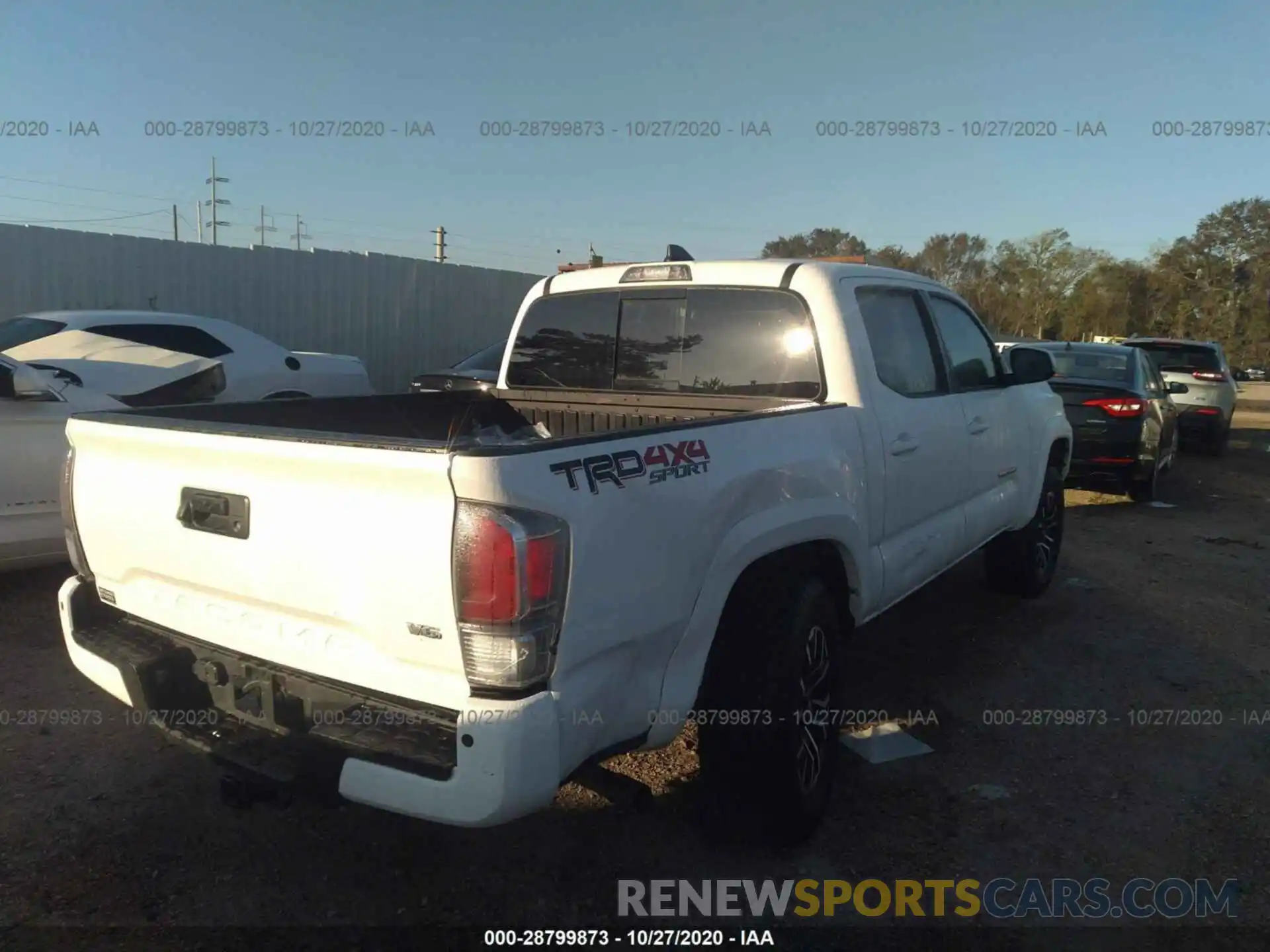 4 Photograph of a damaged car 3TMCZ5AN7LM320394 TOYOTA TACOMA 4WD 2020