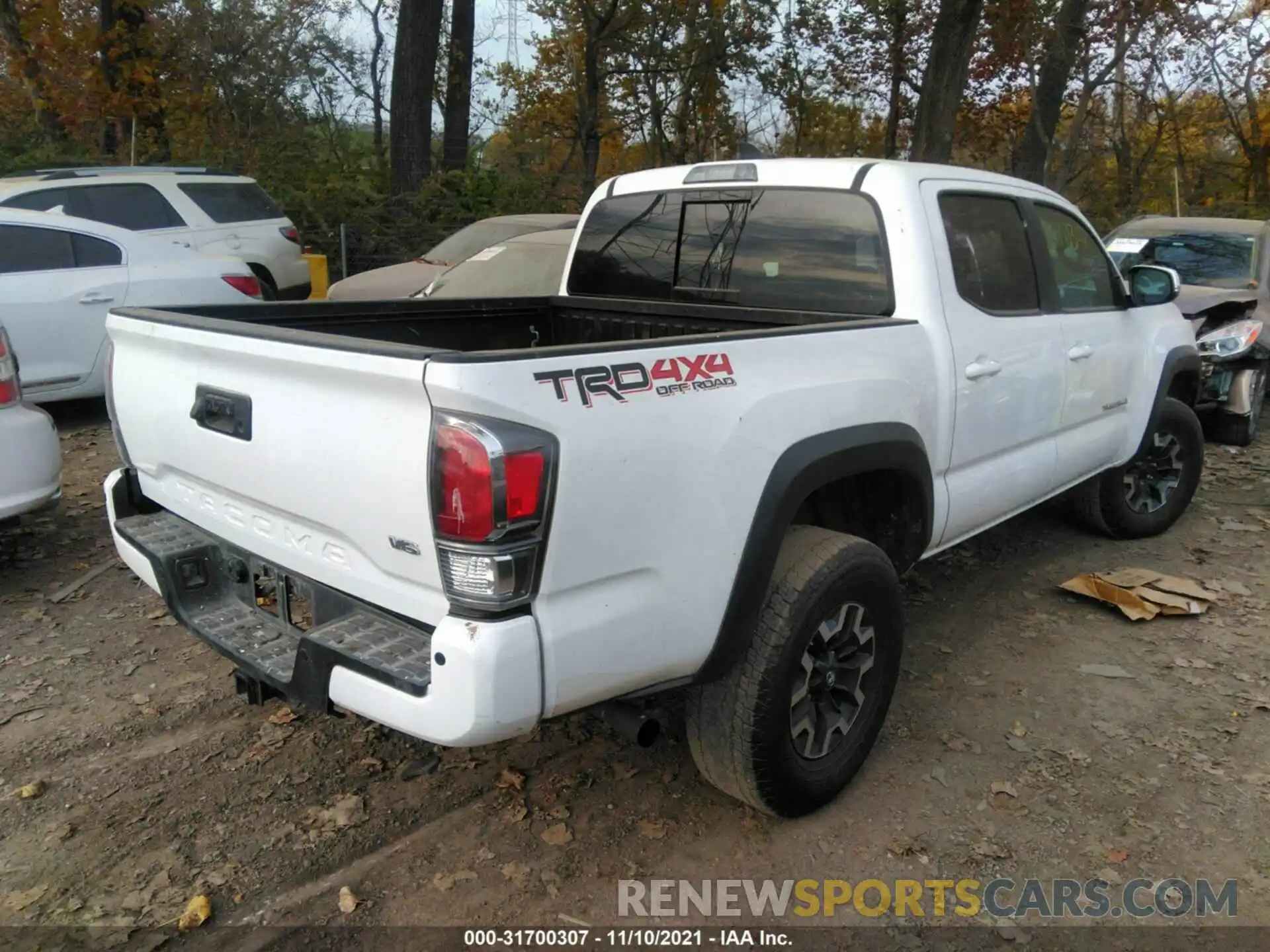 4 Photograph of a damaged car 3TMCZ5AN7LM320525 TOYOTA TACOMA 4WD 2020