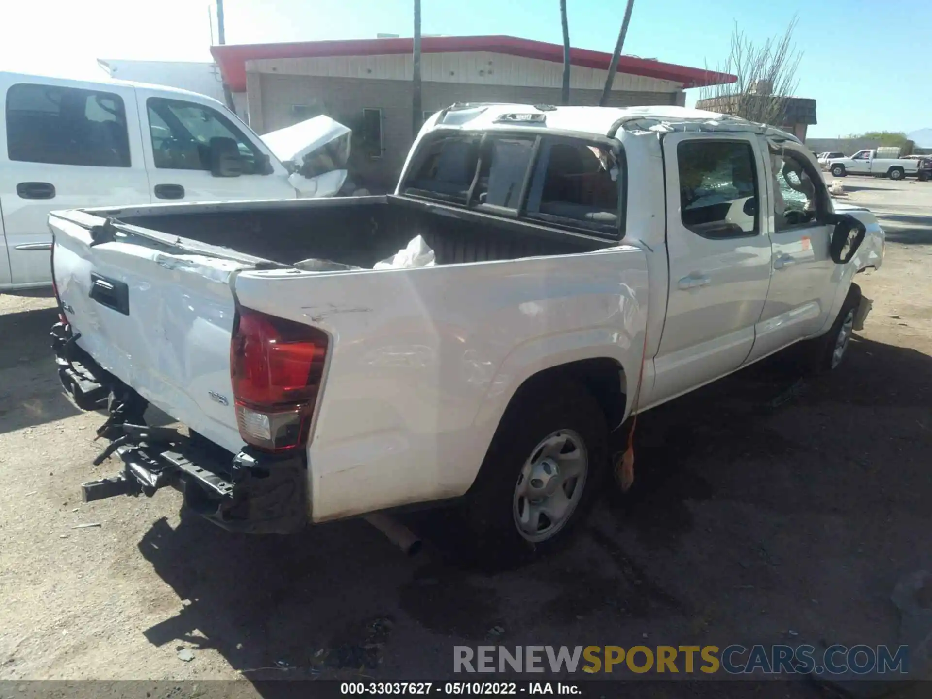 4 Photograph of a damaged car 3TMCZ5AN7LM326972 TOYOTA TACOMA 4WD 2020