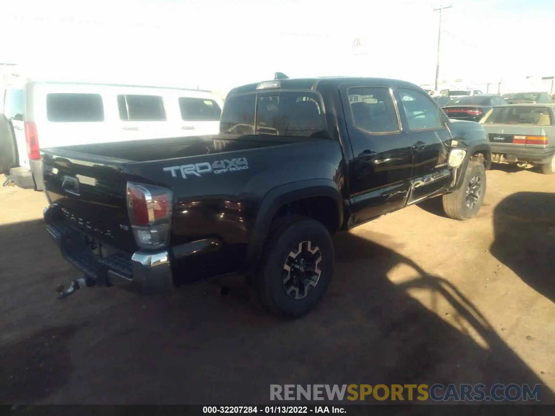 4 Photograph of a damaged car 3TMCZ5AN7LM328298 TOYOTA TACOMA 4WD 2020