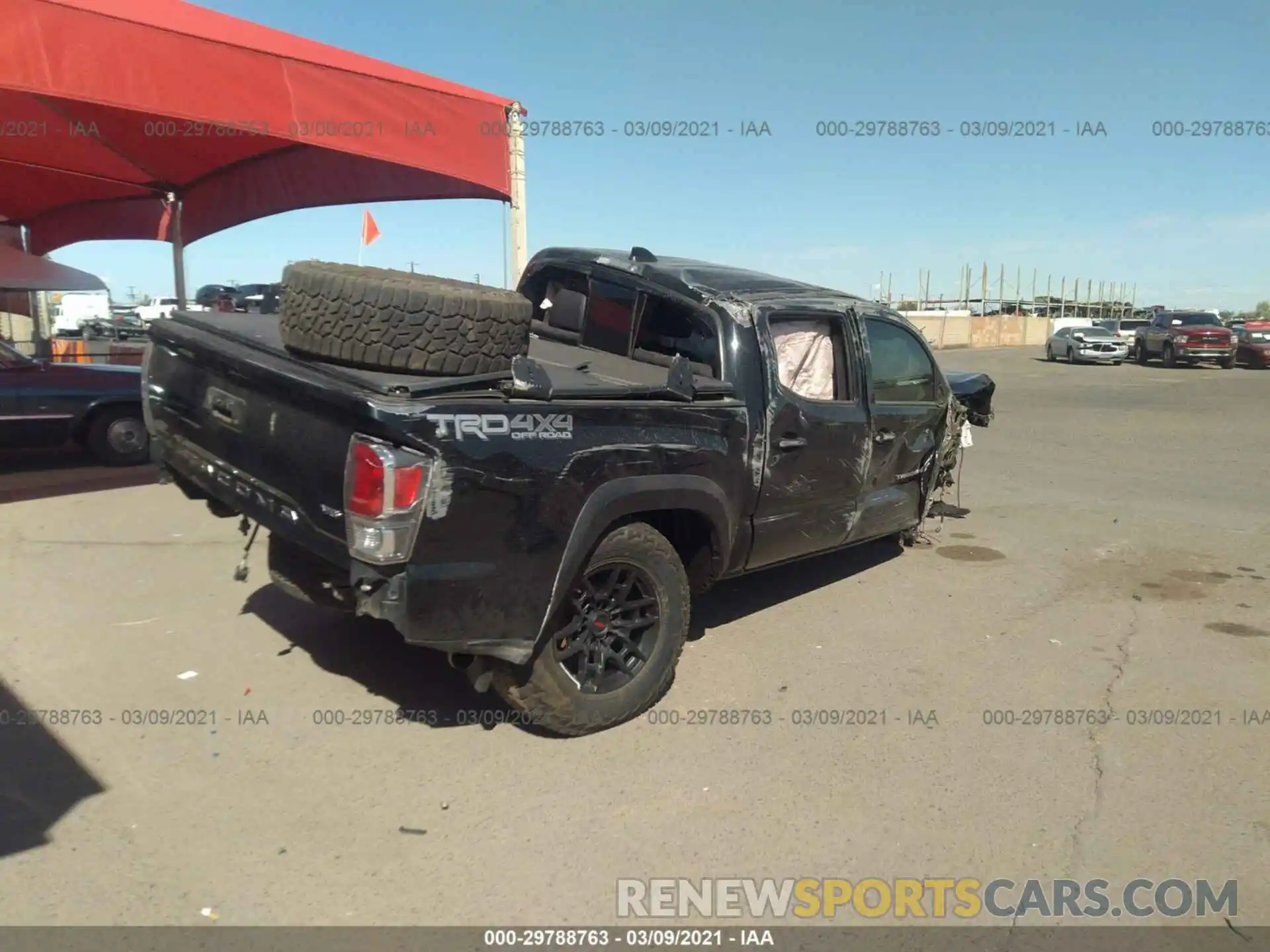 4 Photograph of a damaged car 3TMCZ5AN7LM338975 TOYOTA TACOMA 4WD 2020