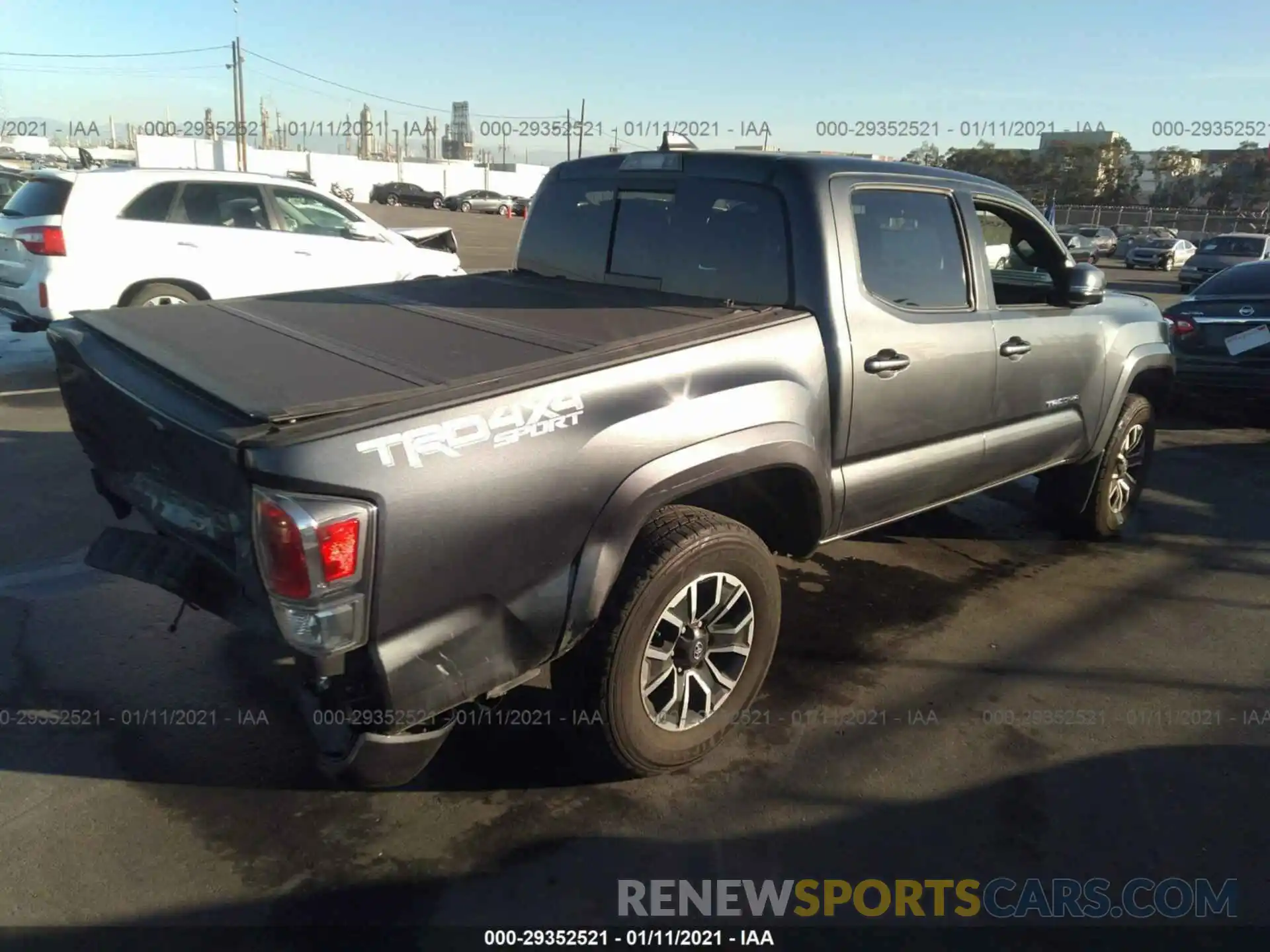 4 Photograph of a damaged car 3TMCZ5AN7LM345523 TOYOTA TACOMA 4WD 2020