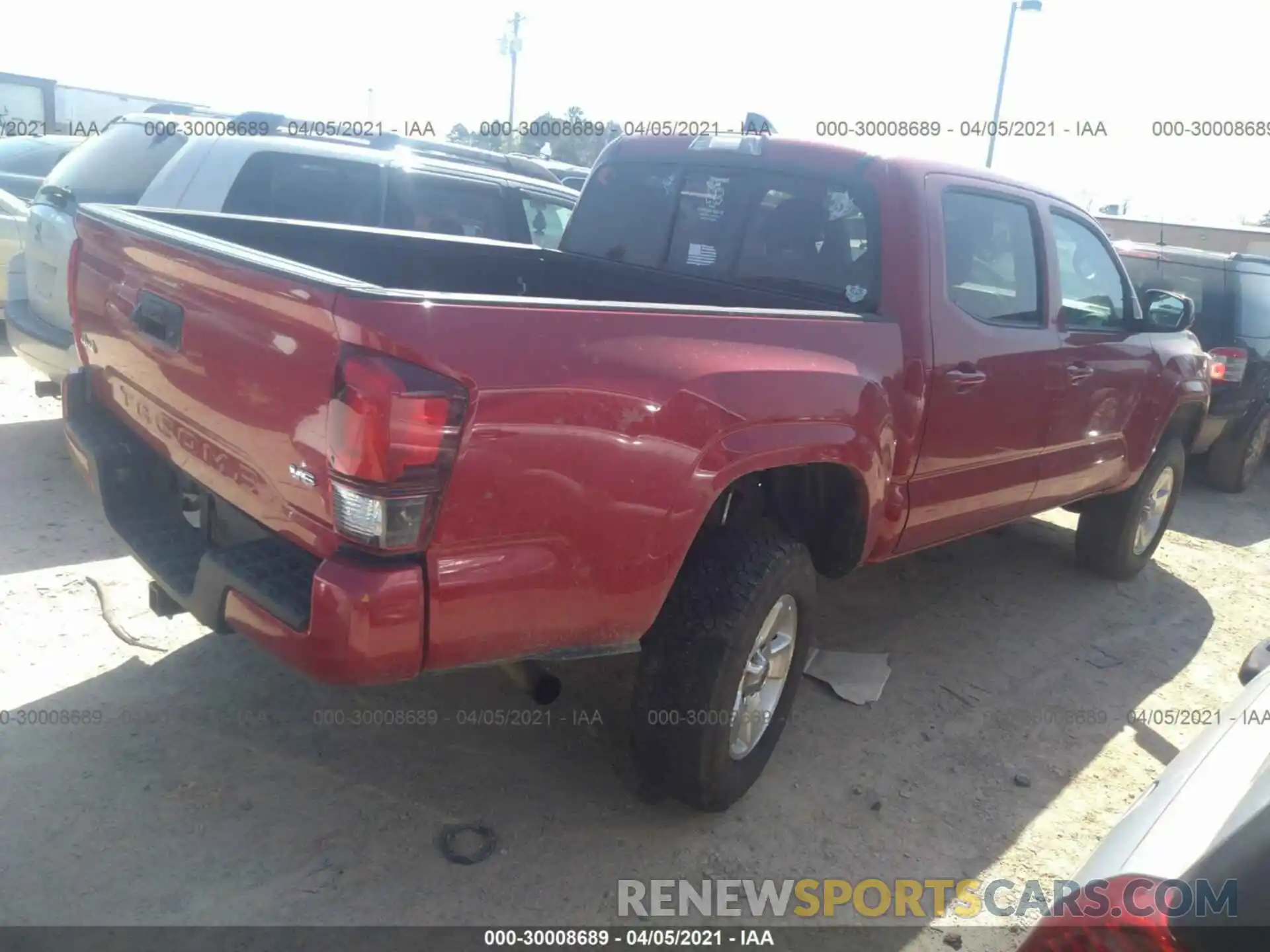 4 Photograph of a damaged car 3TMCZ5AN8LM312515 TOYOTA TACOMA 4WD 2020