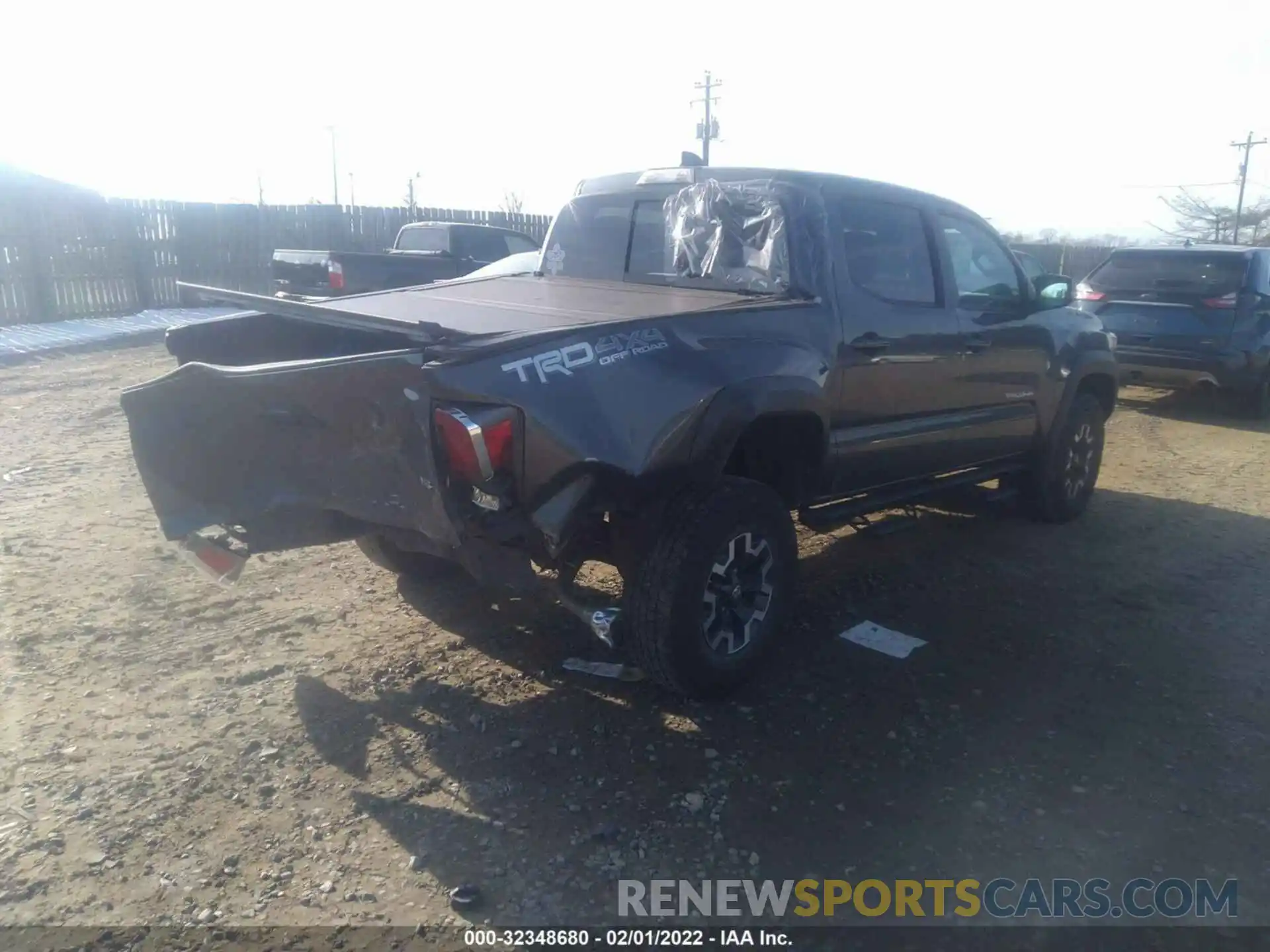 4 Photograph of a damaged car 3TMCZ5AN8LM322767 TOYOTA TACOMA 4WD 2020