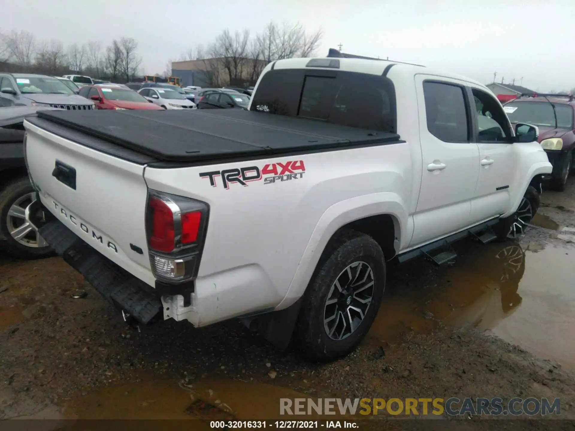 4 Photograph of a damaged car 3TMCZ5AN8LM344655 TOYOTA TACOMA 4WD 2020