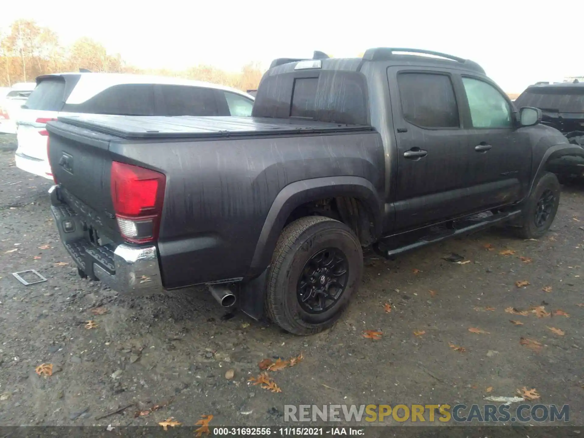 4 Photograph of a damaged car 3TMCZ5AN8LM358409 TOYOTA TACOMA 4WD 2020