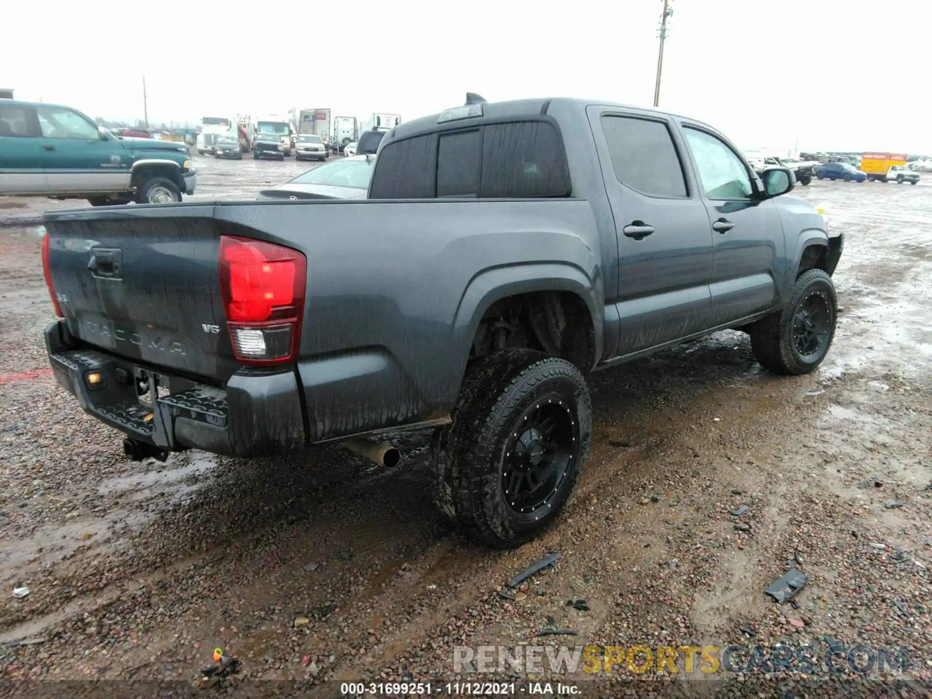 4 Photograph of a damaged car 3TMCZ5AN8LM361262 TOYOTA TACOMA 4WD 2020