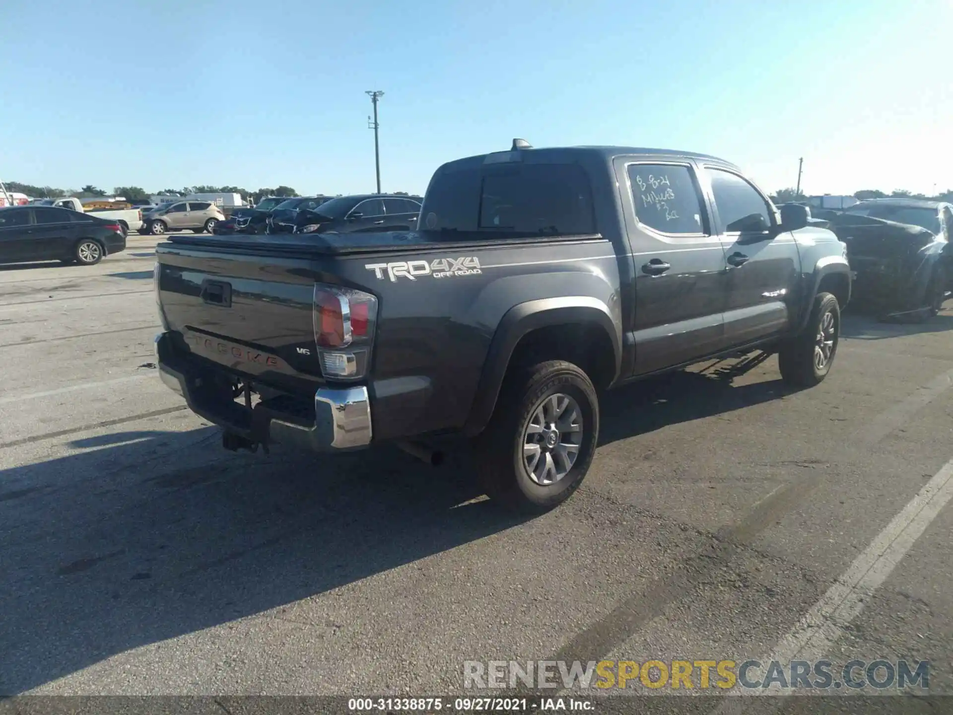 4 Photograph of a damaged car 3TMCZ5AN9LM296423 TOYOTA TACOMA 4WD 2020