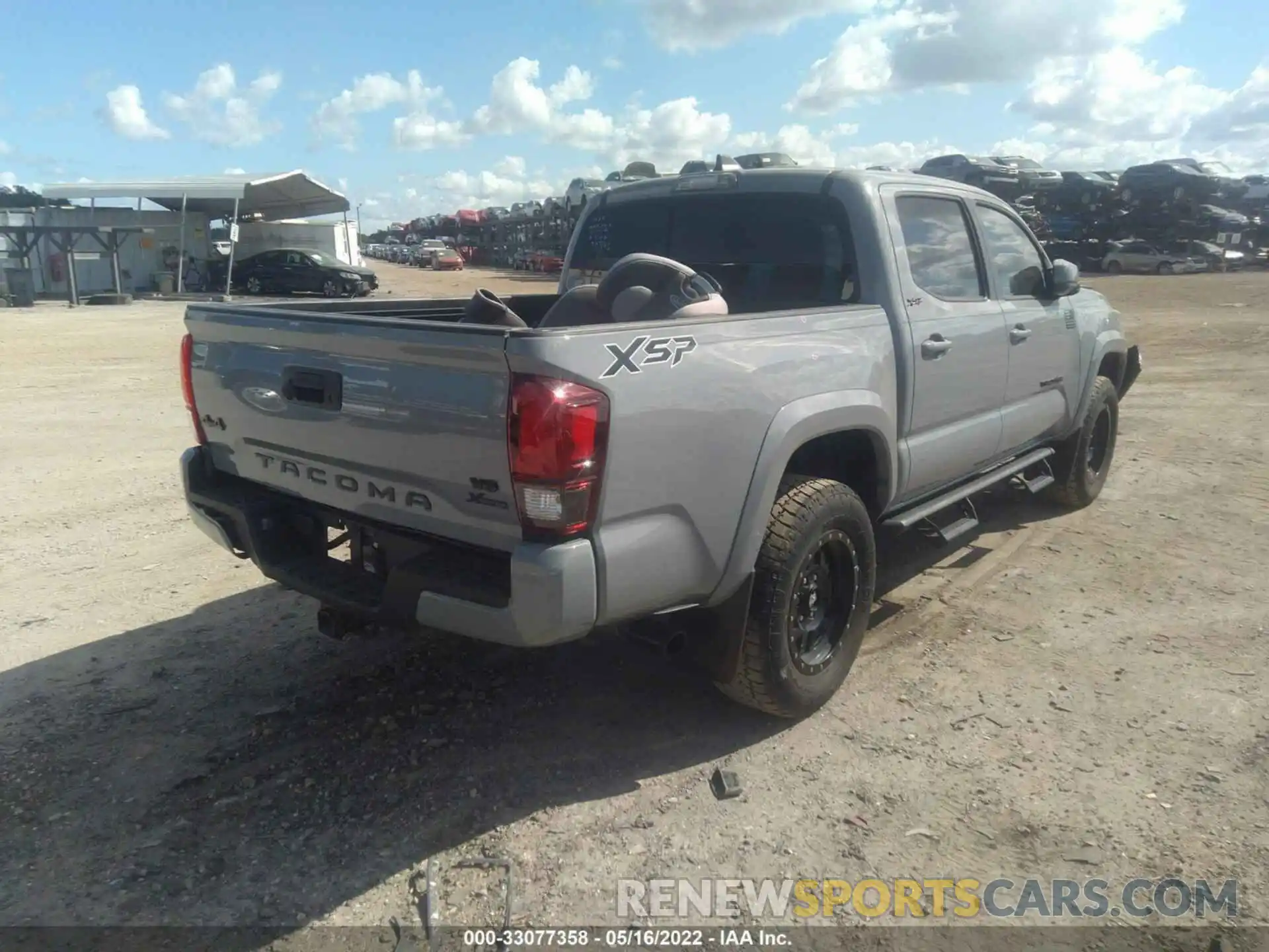 4 Photograph of a damaged car 3TMCZ5AN9LM300552 TOYOTA TACOMA 4WD 2020