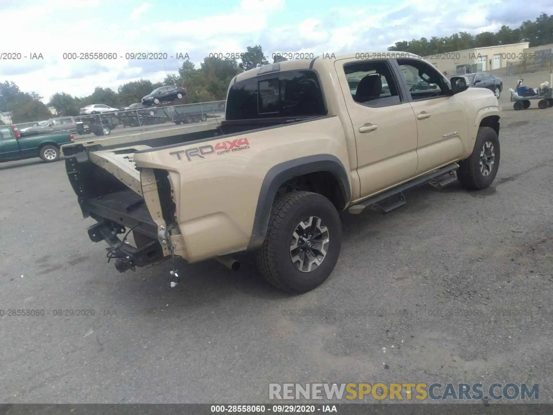 4 Photograph of a damaged car 3TMCZ5AN9LM311163 TOYOTA TACOMA 4WD 2020