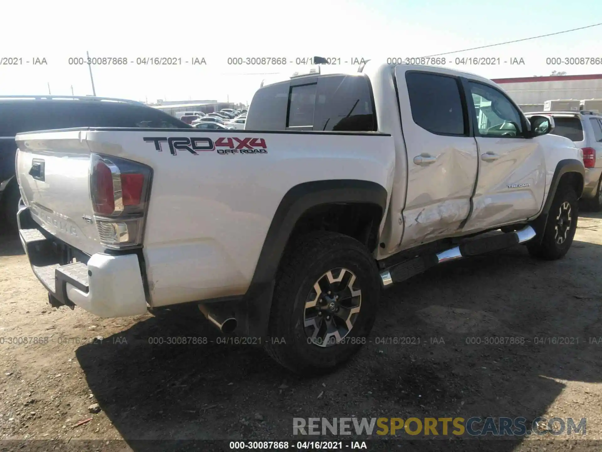 4 Photograph of a damaged car 3TMCZ5AN9LM313382 TOYOTA TACOMA 4WD 2020