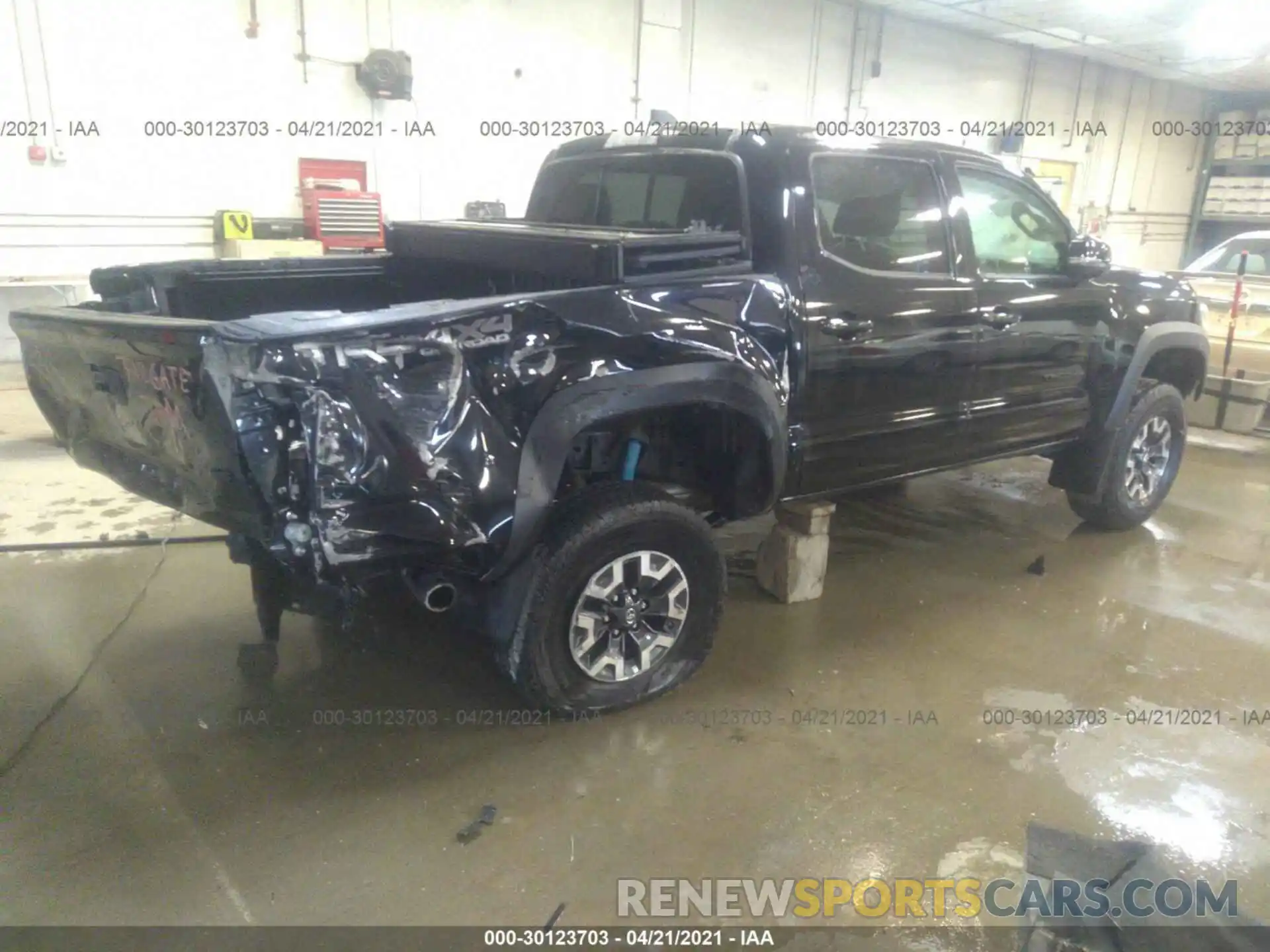 4 Photograph of a damaged car 3TMCZ5AN9LM317349 TOYOTA TACOMA 4WD 2020