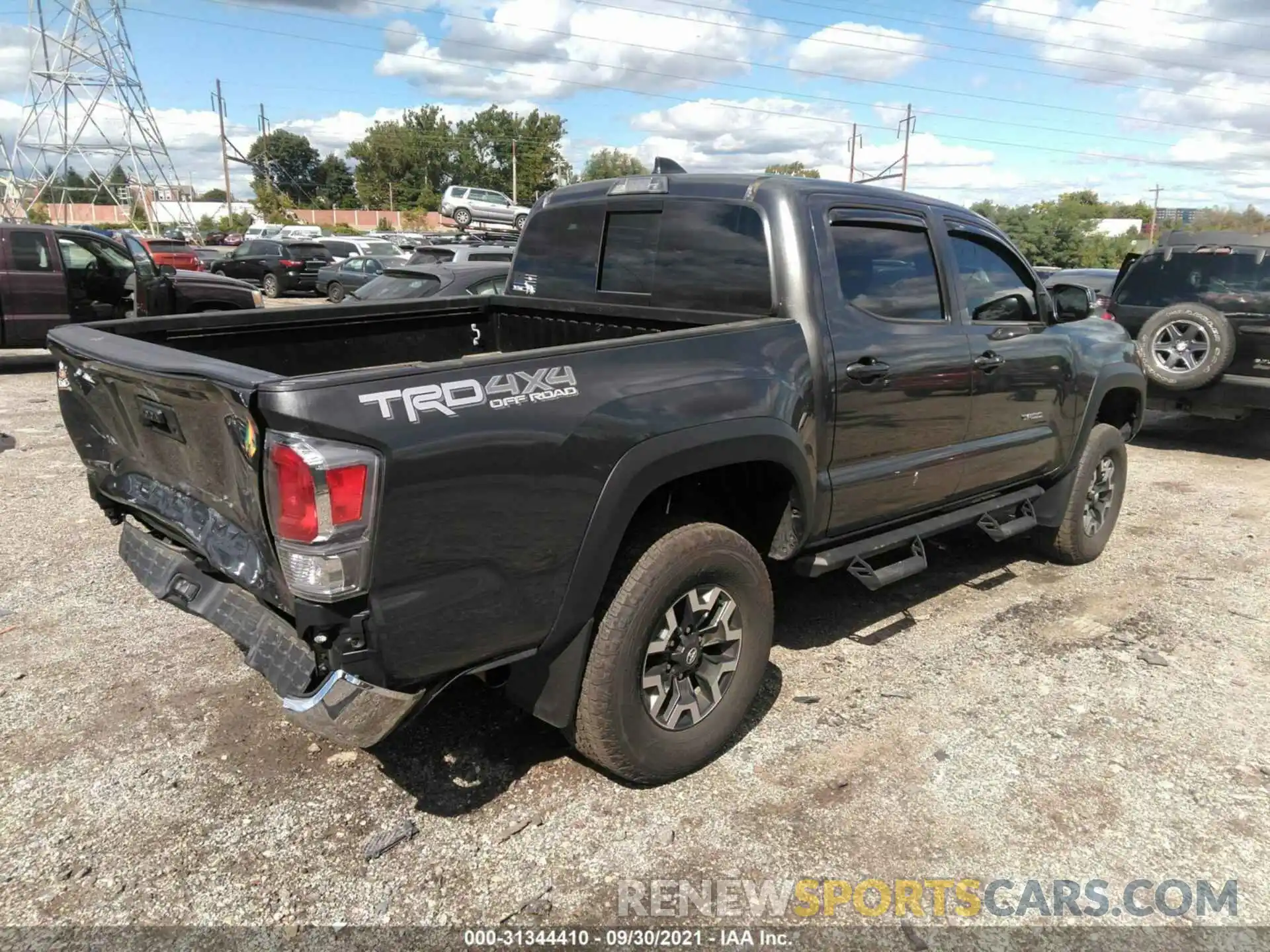 4 Photograph of a damaged car 3TMCZ5AN9LM321336 TOYOTA TACOMA 4WD 2020