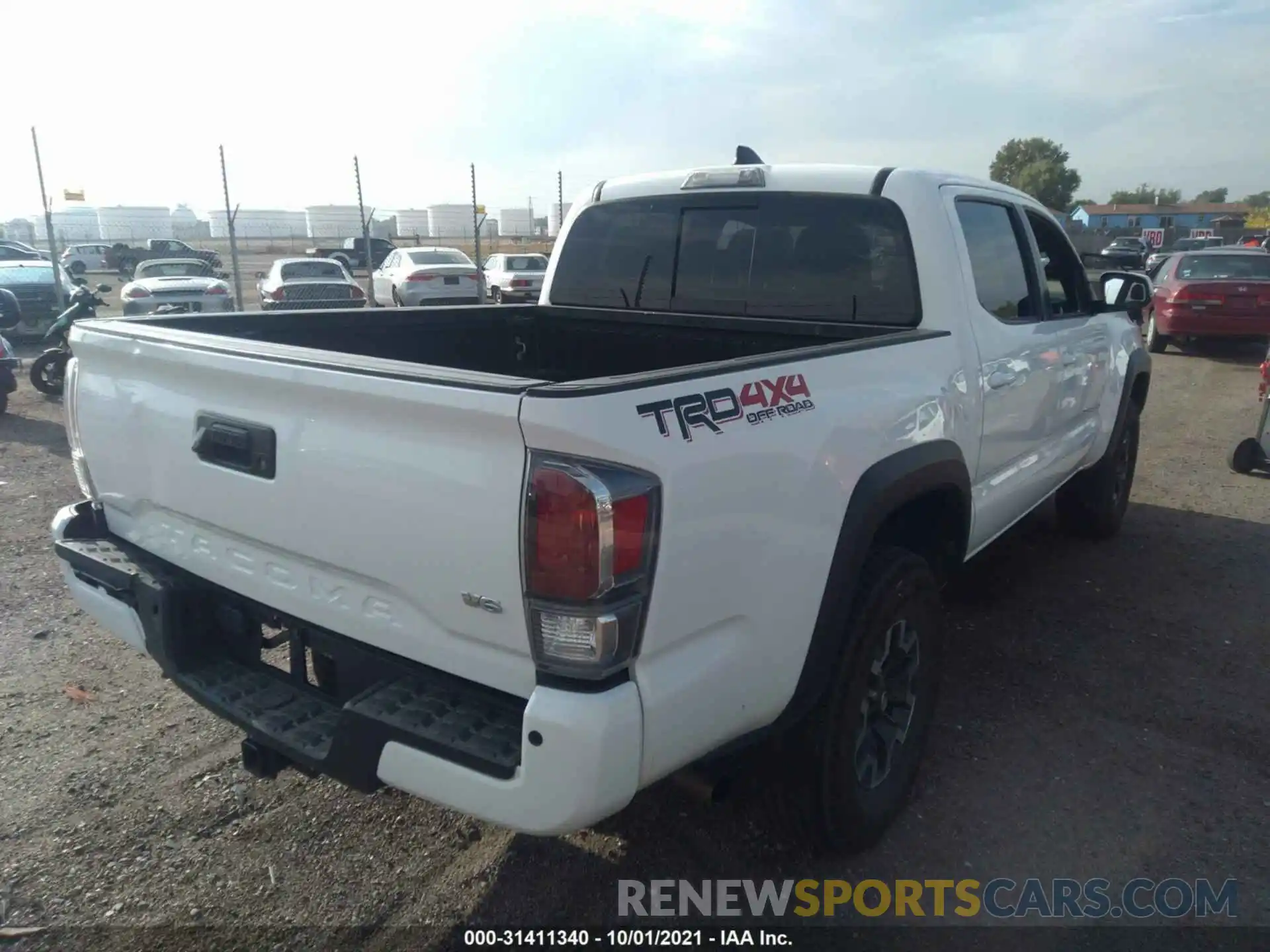 4 Photograph of a damaged car 3TMCZ5AN9LM323331 TOYOTA TACOMA 4WD 2020