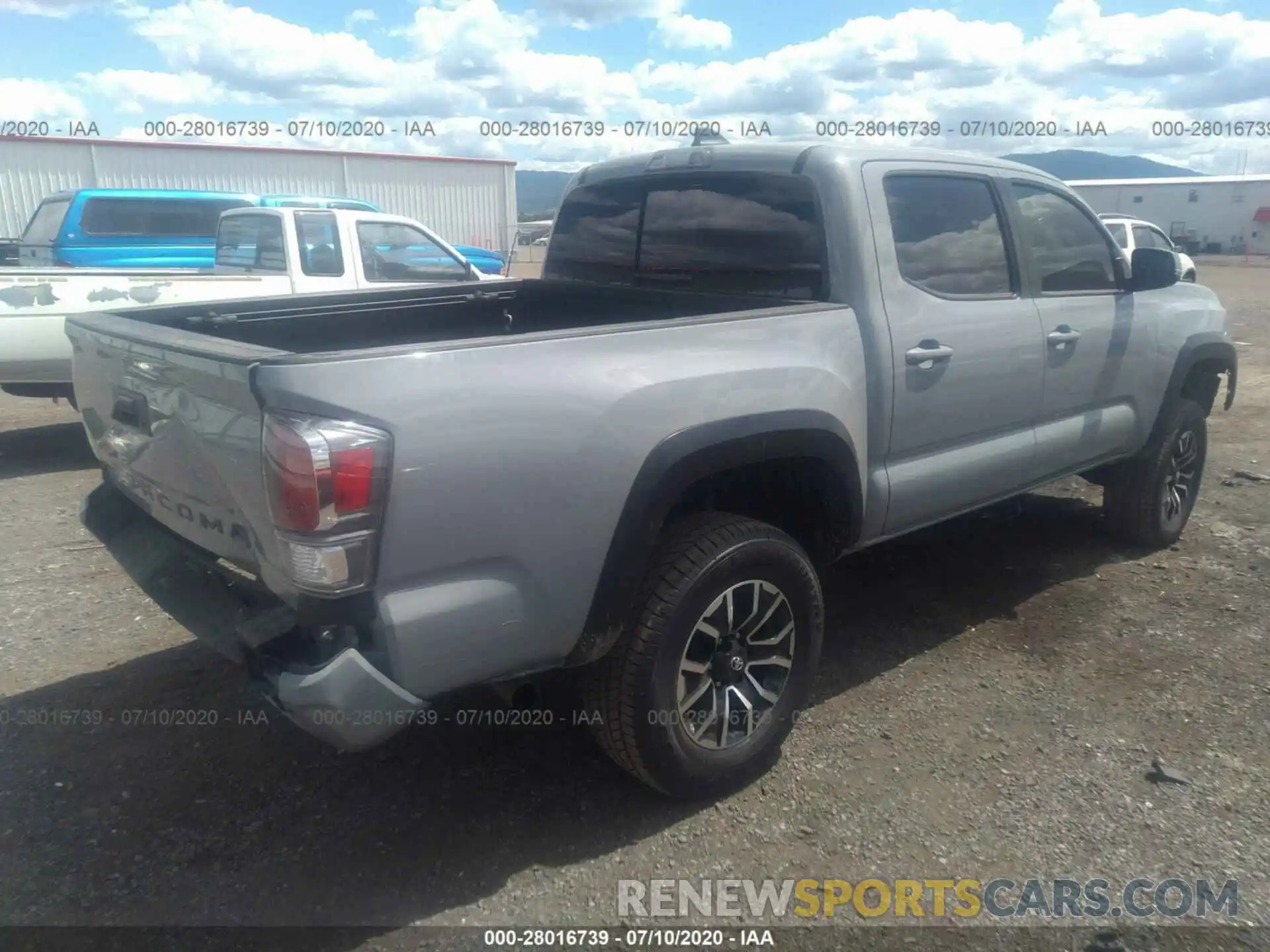 4 Photograph of a damaged car 3TMCZ5AN9LM325063 TOYOTA TACOMA 4WD 2020