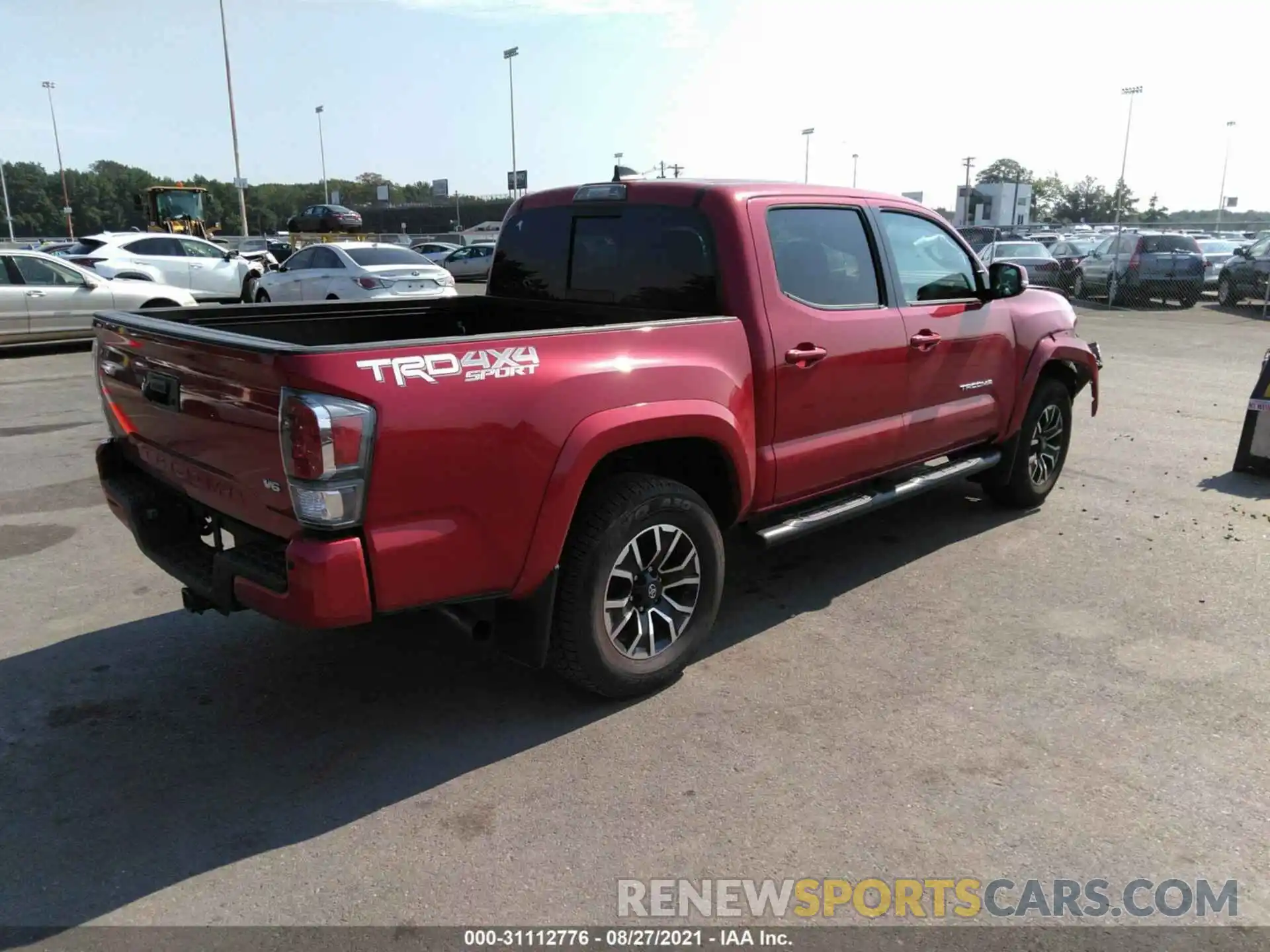 4 Photograph of a damaged car 3TMCZ5AN9LM326973 TOYOTA TACOMA 4WD 2020