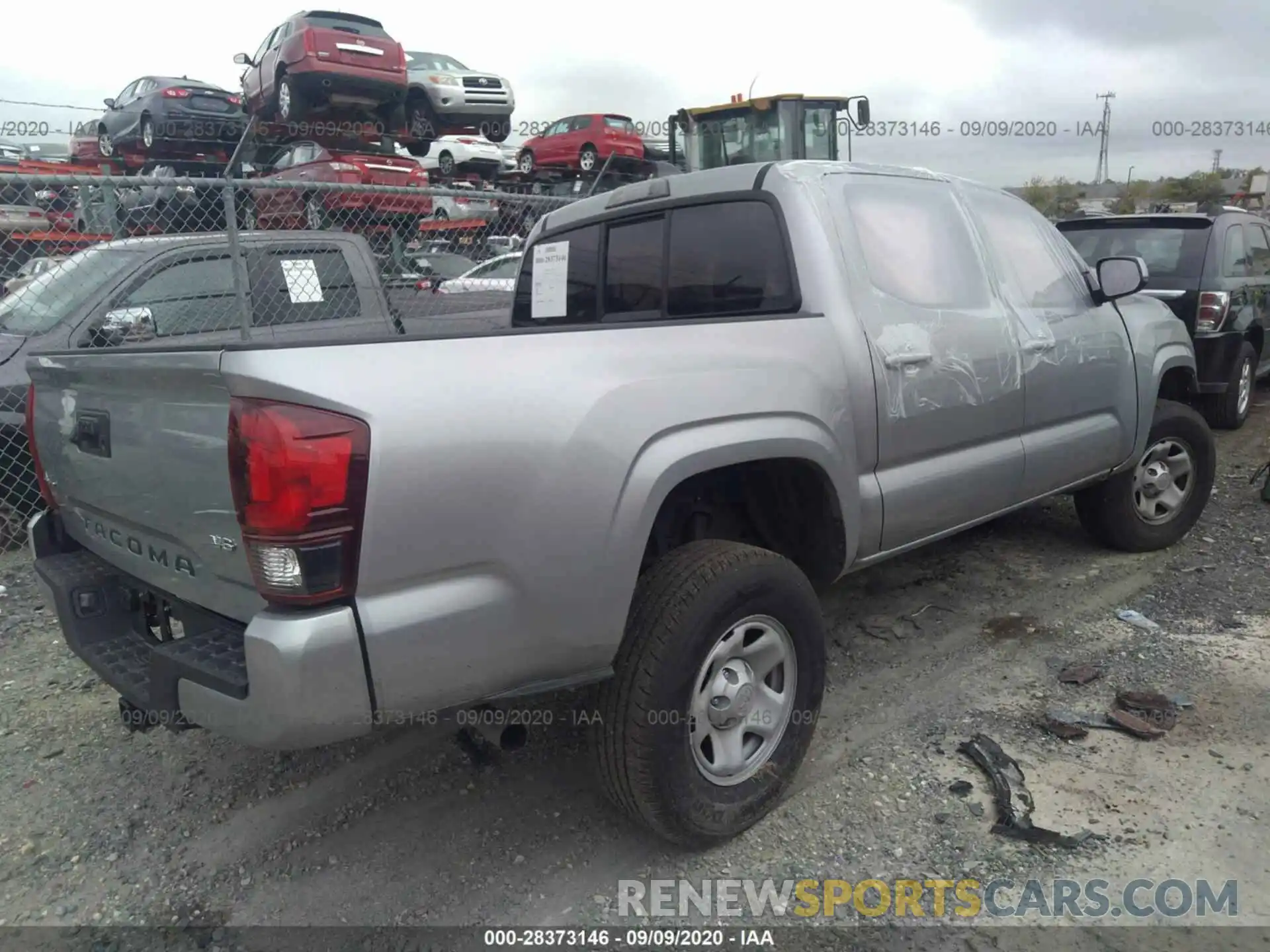 4 Photograph of a damaged car 3TMCZ5AN9LM330702 TOYOTA TACOMA 4WD 2020