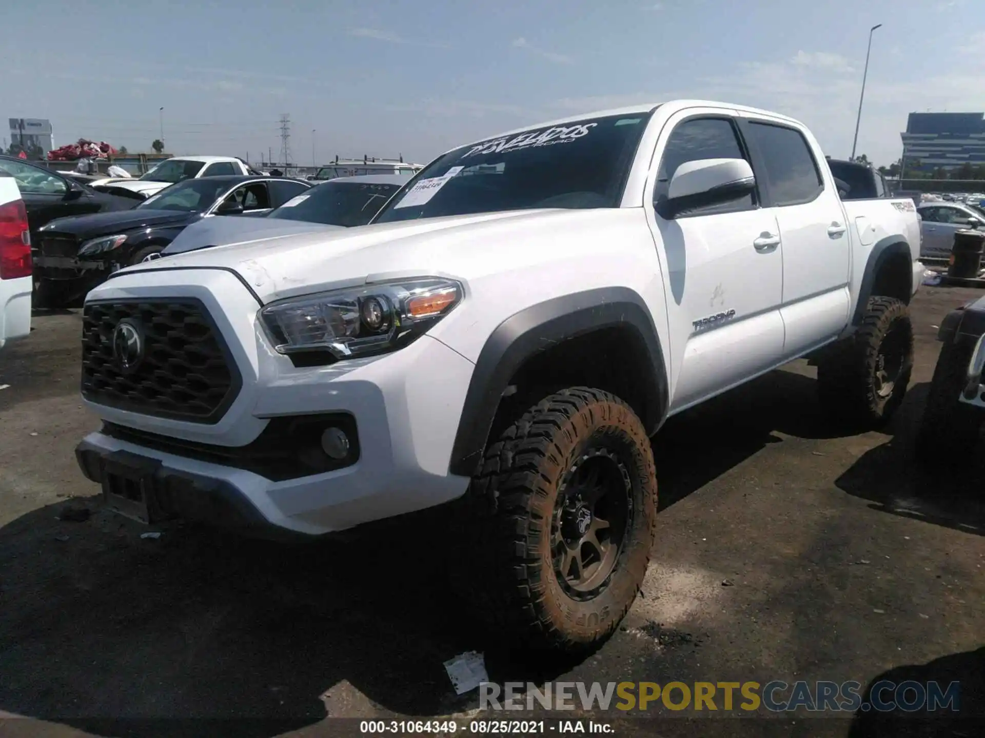 2 Photograph of a damaged car 3TMCZ5AN9LM360833 TOYOTA TACOMA 4WD 2020