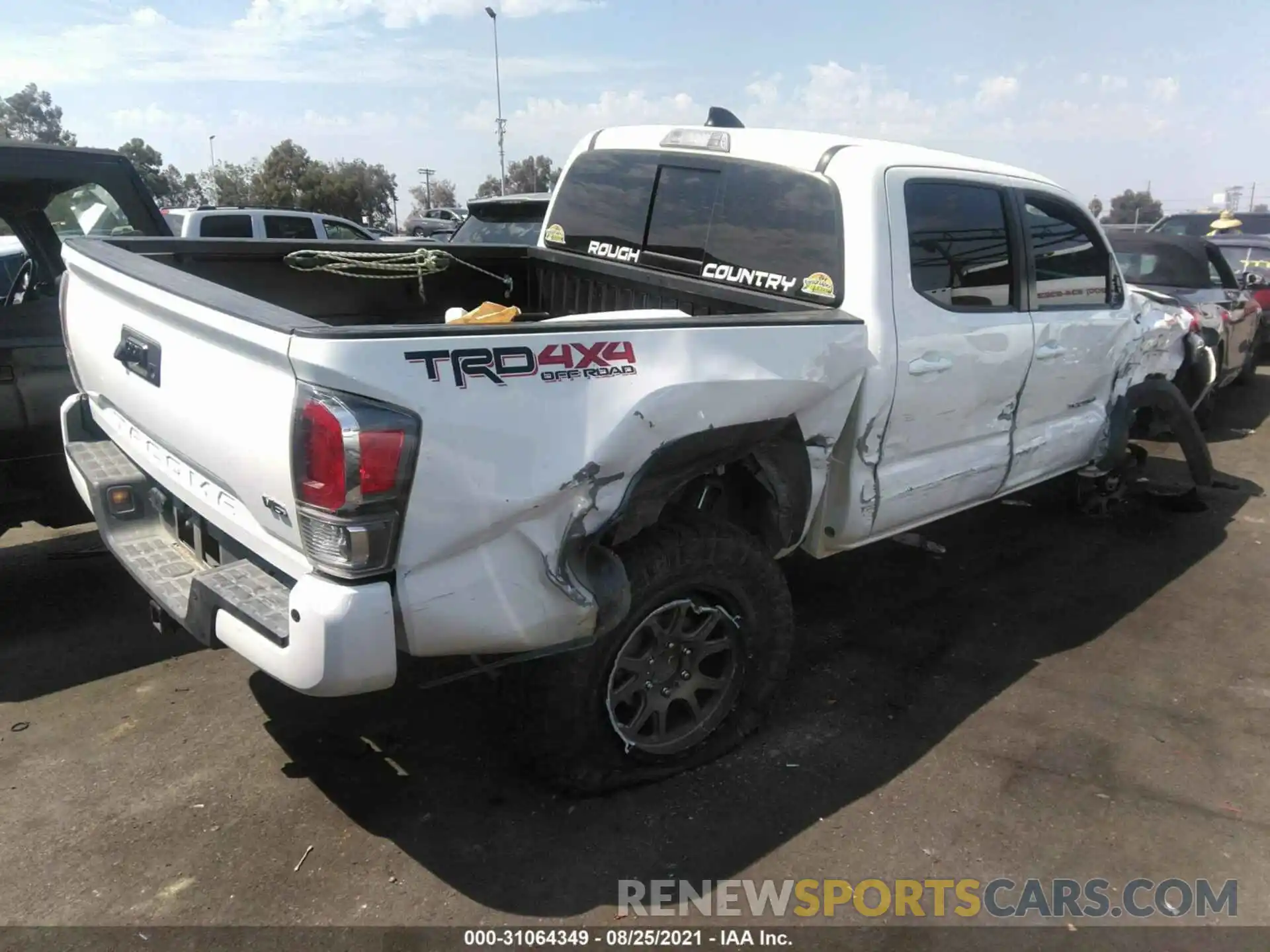 4 Photograph of a damaged car 3TMCZ5AN9LM360833 TOYOTA TACOMA 4WD 2020