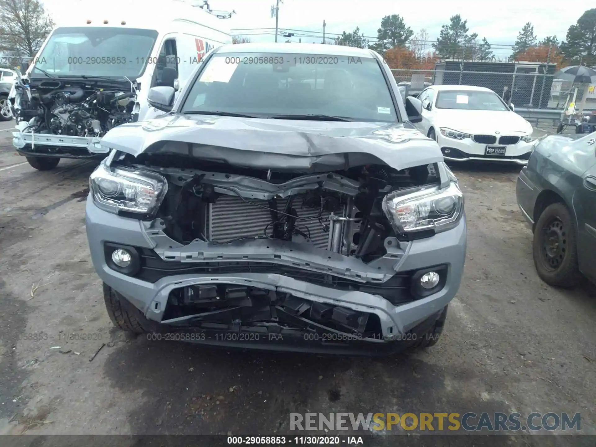 4 Photograph of a damaged car 3TMCZ5AN9LM364218 TOYOTA TACOMA 4WD 2020