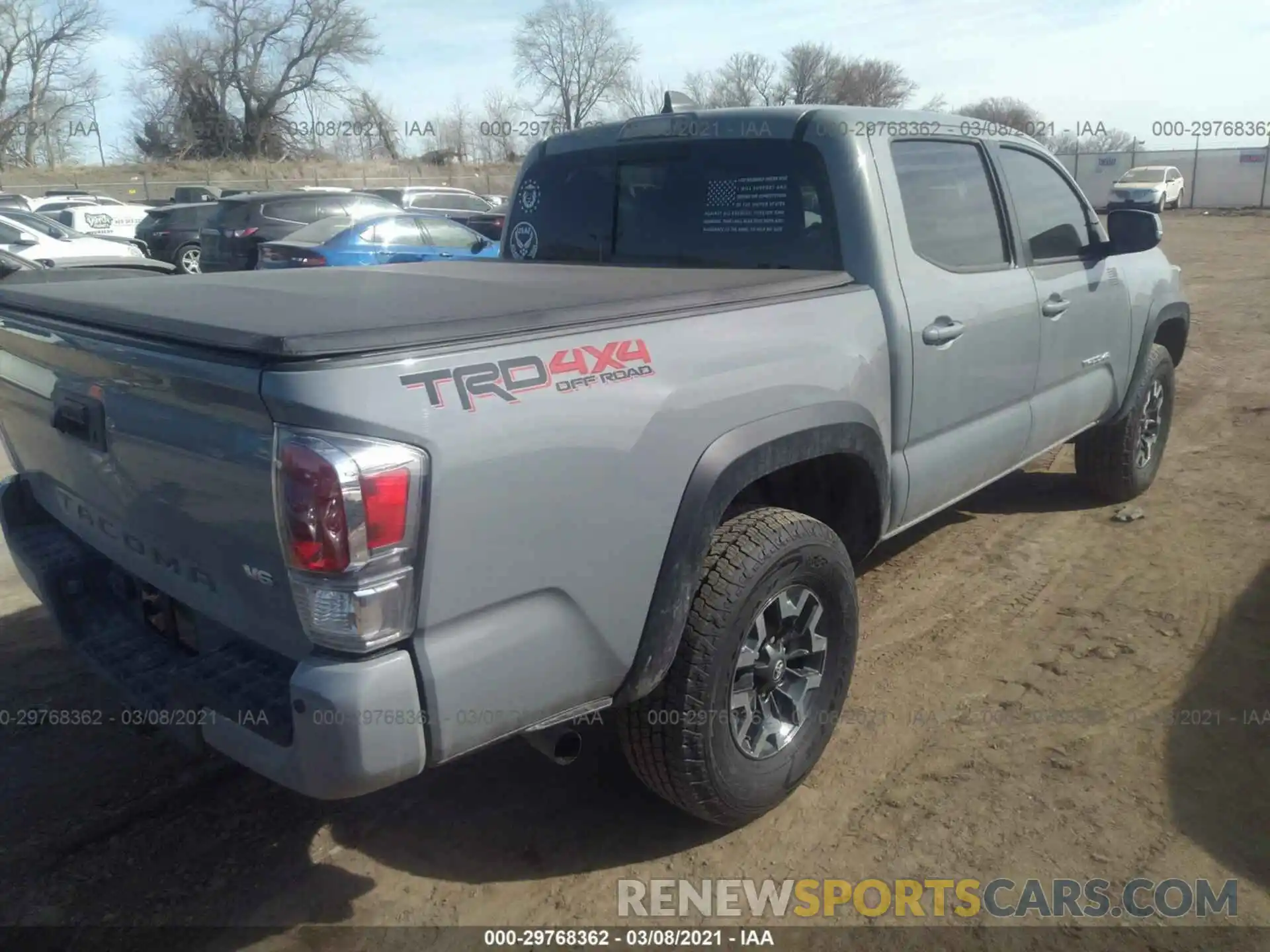 4 Photograph of a damaged car 3TMCZ5AN9LM366194 TOYOTA TACOMA 4WD 2020