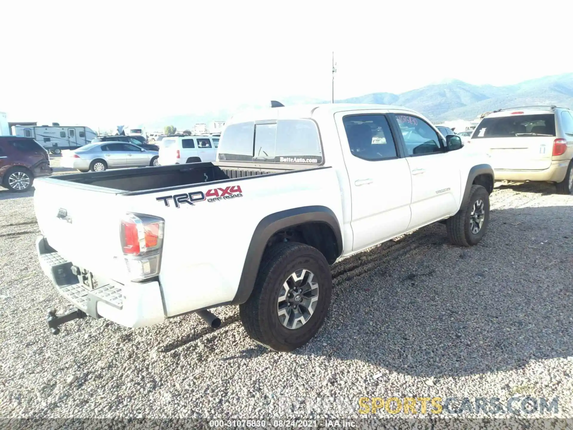 4 Photograph of a damaged car 3TMCZ5AN9LM367586 TOYOTA TACOMA 4WD 2020