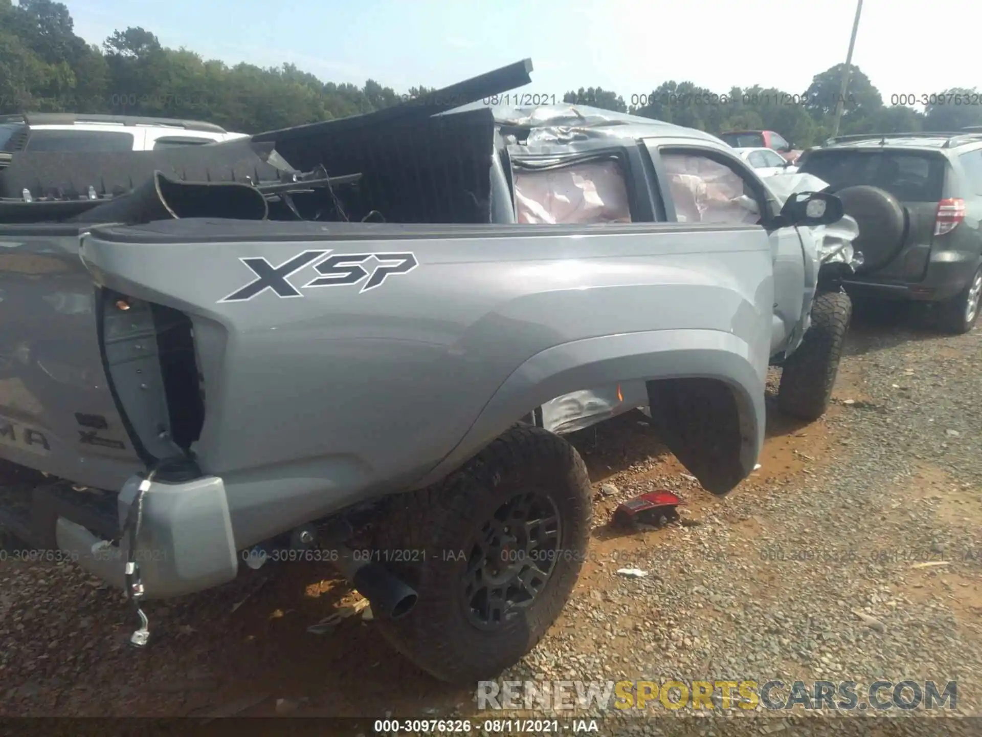 4 Photograph of a damaged car 3TMCZ5ANXLM298830 TOYOTA TACOMA 4WD 2020