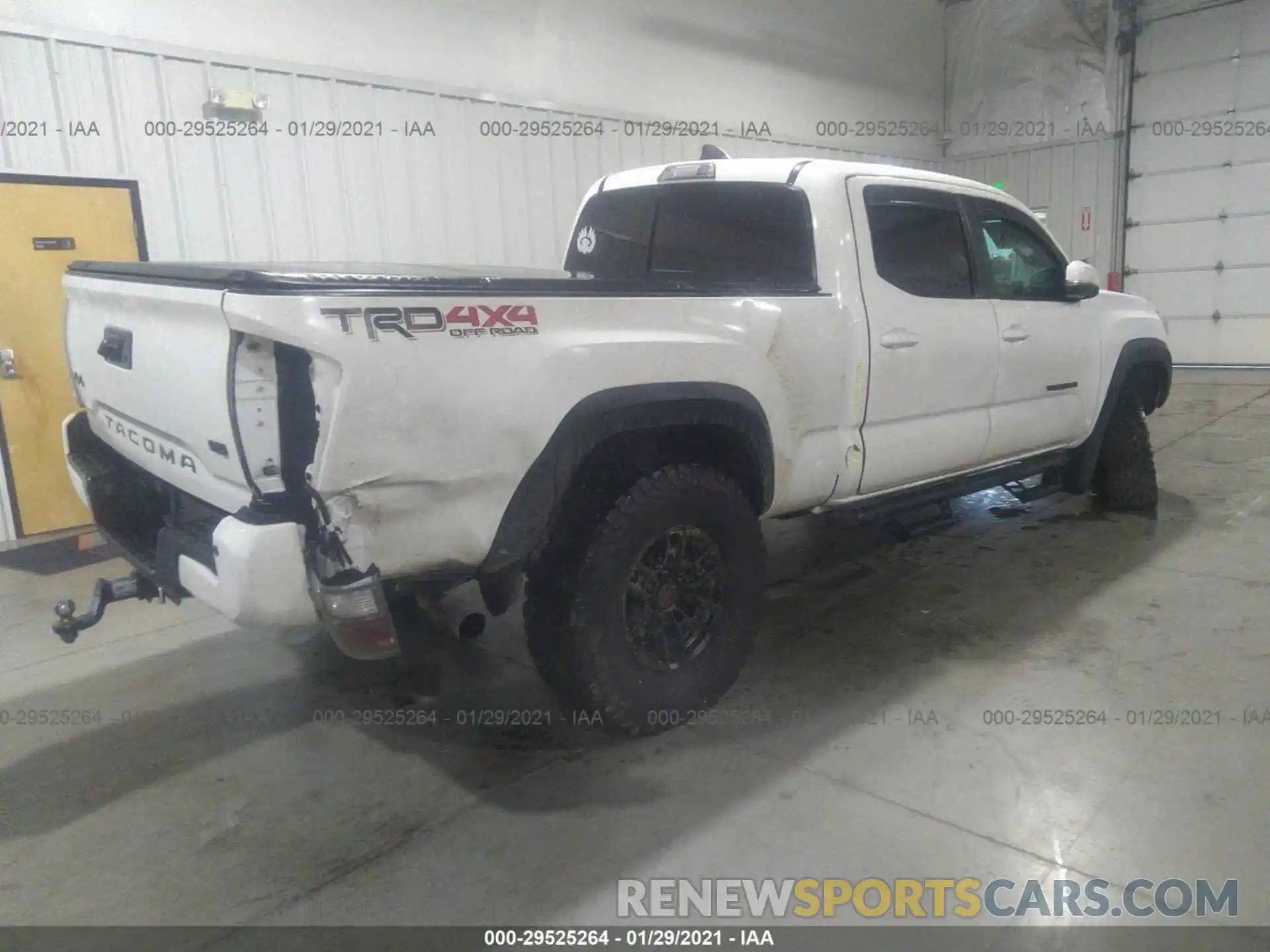 4 Photograph of a damaged car 3TMDZ5BN0LM080821 TOYOTA TACOMA 4WD 2020