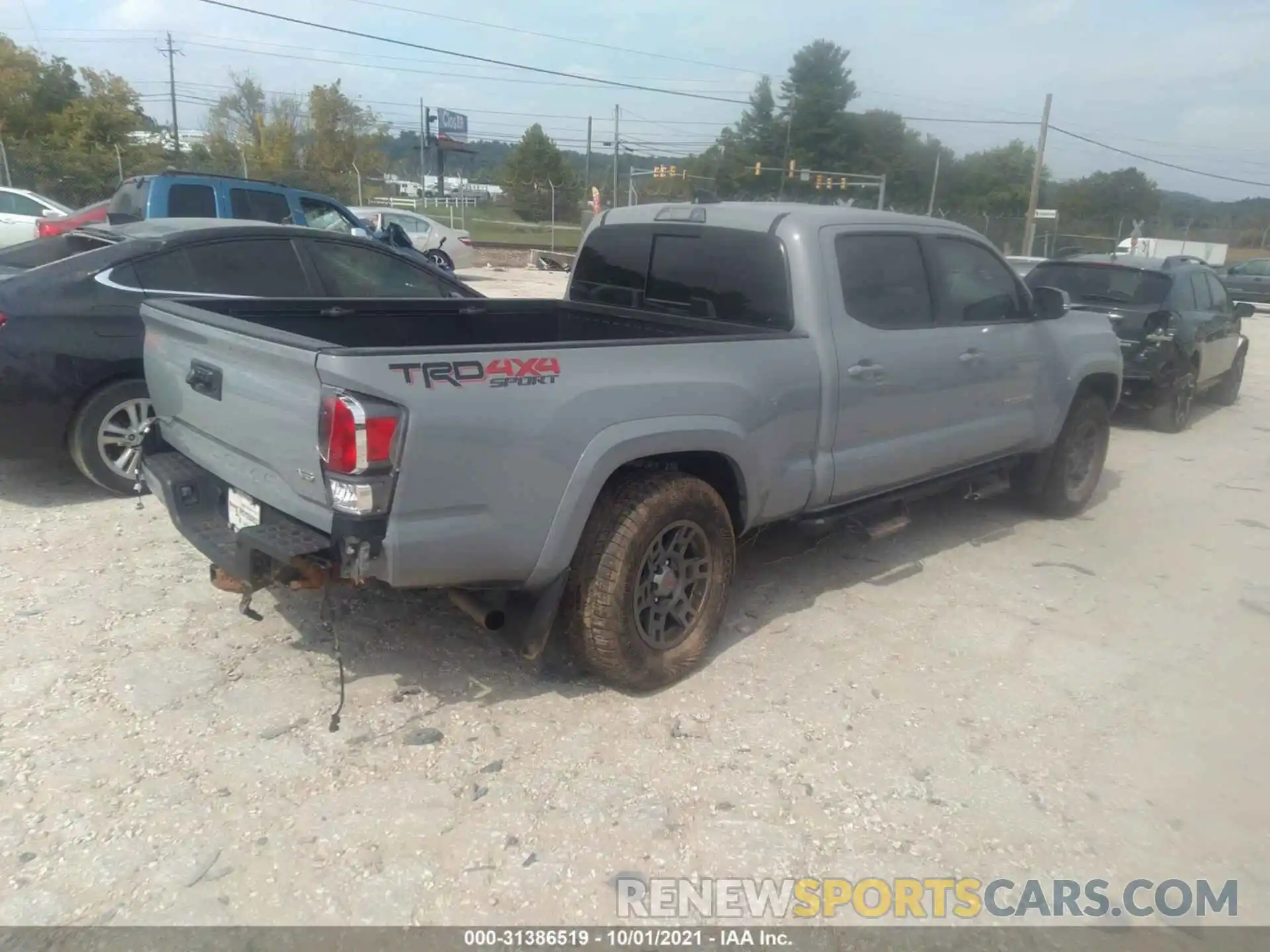 4 Photograph of a damaged car 3TMDZ5BN0LM085453 TOYOTA TACOMA 4WD 2020