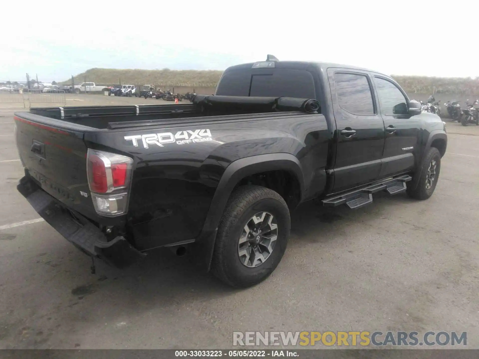 4 Photograph of a damaged car 3TMDZ5BN0LM097845 TOYOTA TACOMA 4WD 2020