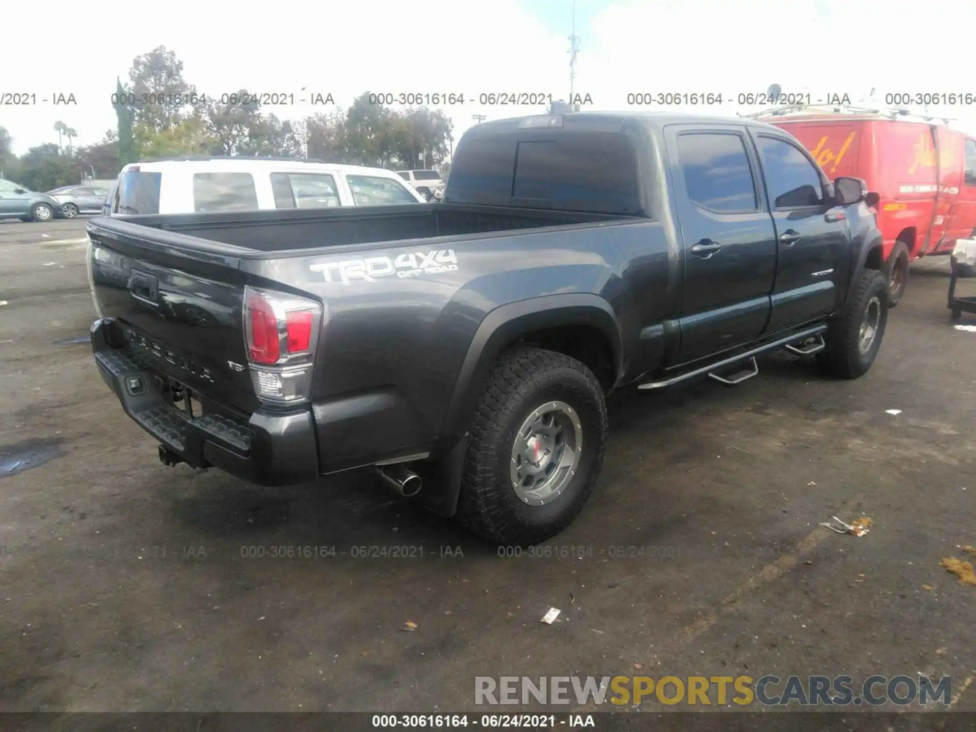 4 Photograph of a damaged car 3TMDZ5BN1LM079998 TOYOTA TACOMA 4WD 2020