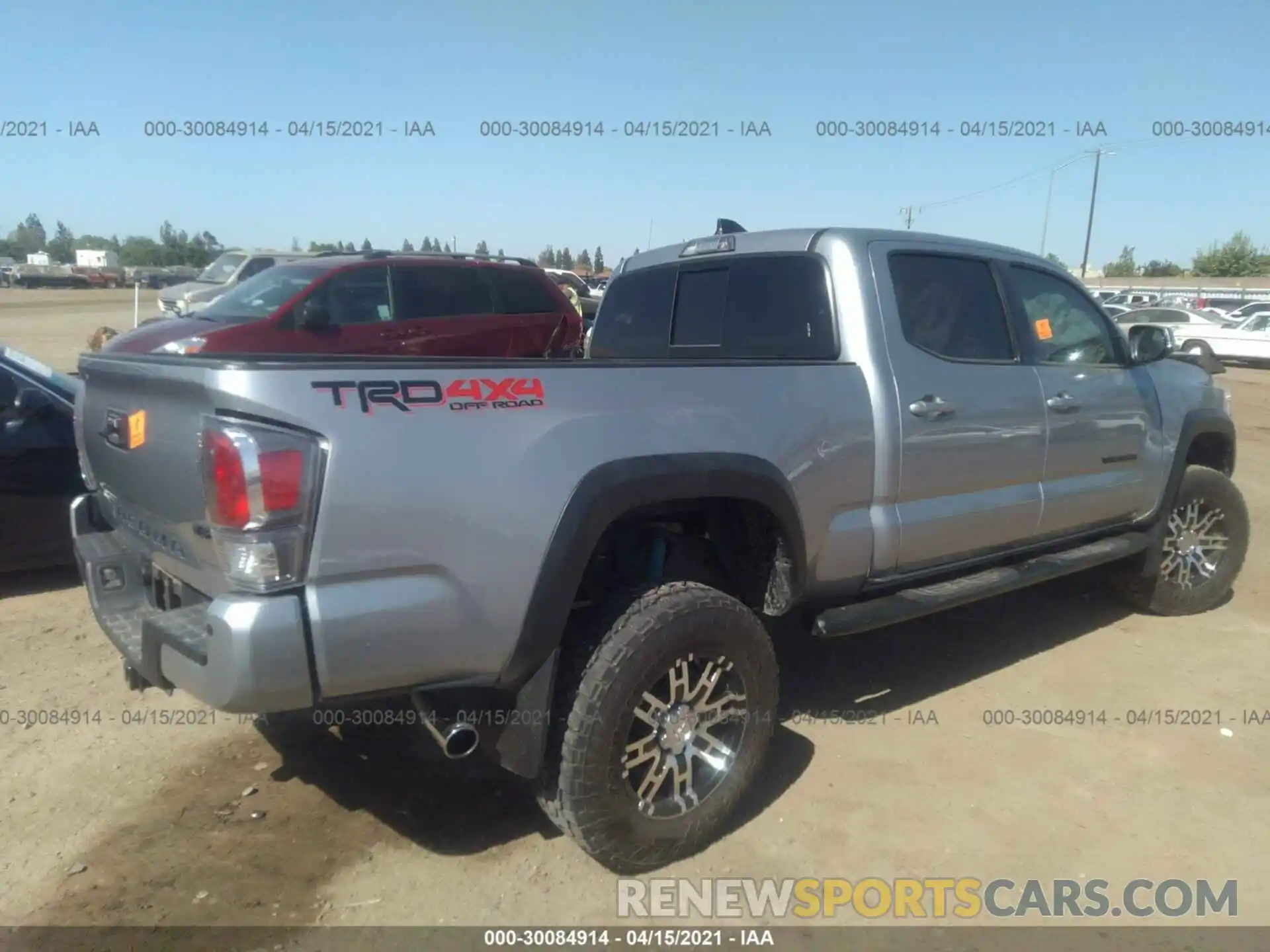 4 Photograph of a damaged car 3TMDZ5BN1LM095568 TOYOTA TACOMA 4WD 2020