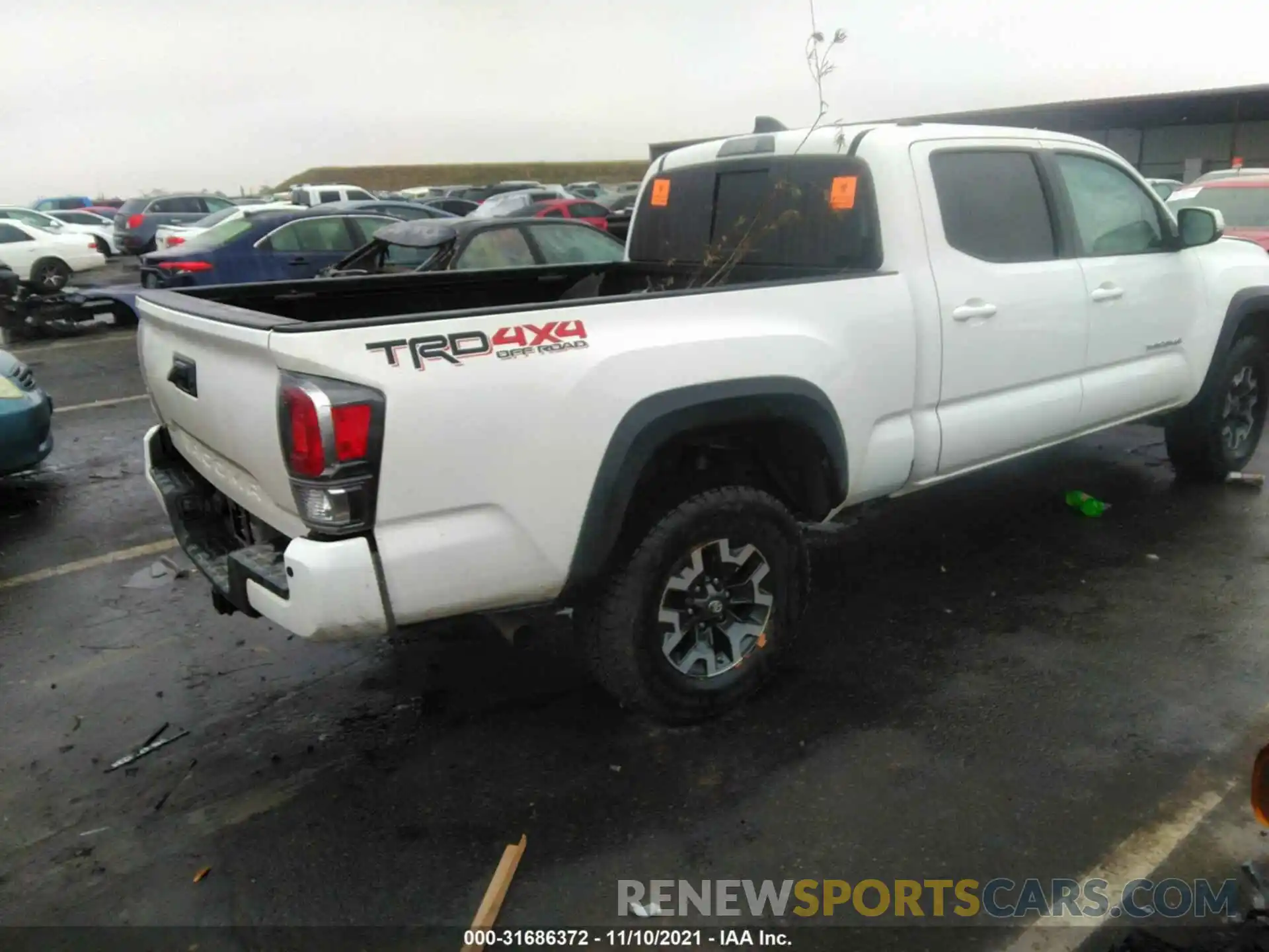 4 Photograph of a damaged car 3TMDZ5BN2LM097426 TOYOTA TACOMA 4WD 2020