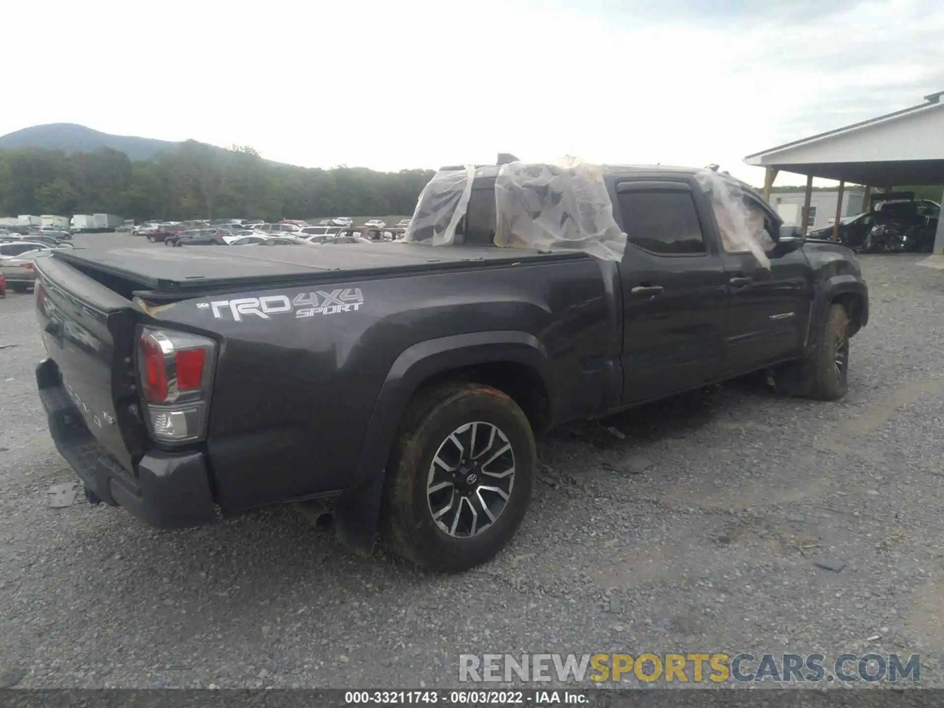 4 Photograph of a damaged car 3TMDZ5BN4LM093796 TOYOTA TACOMA 4WD 2020