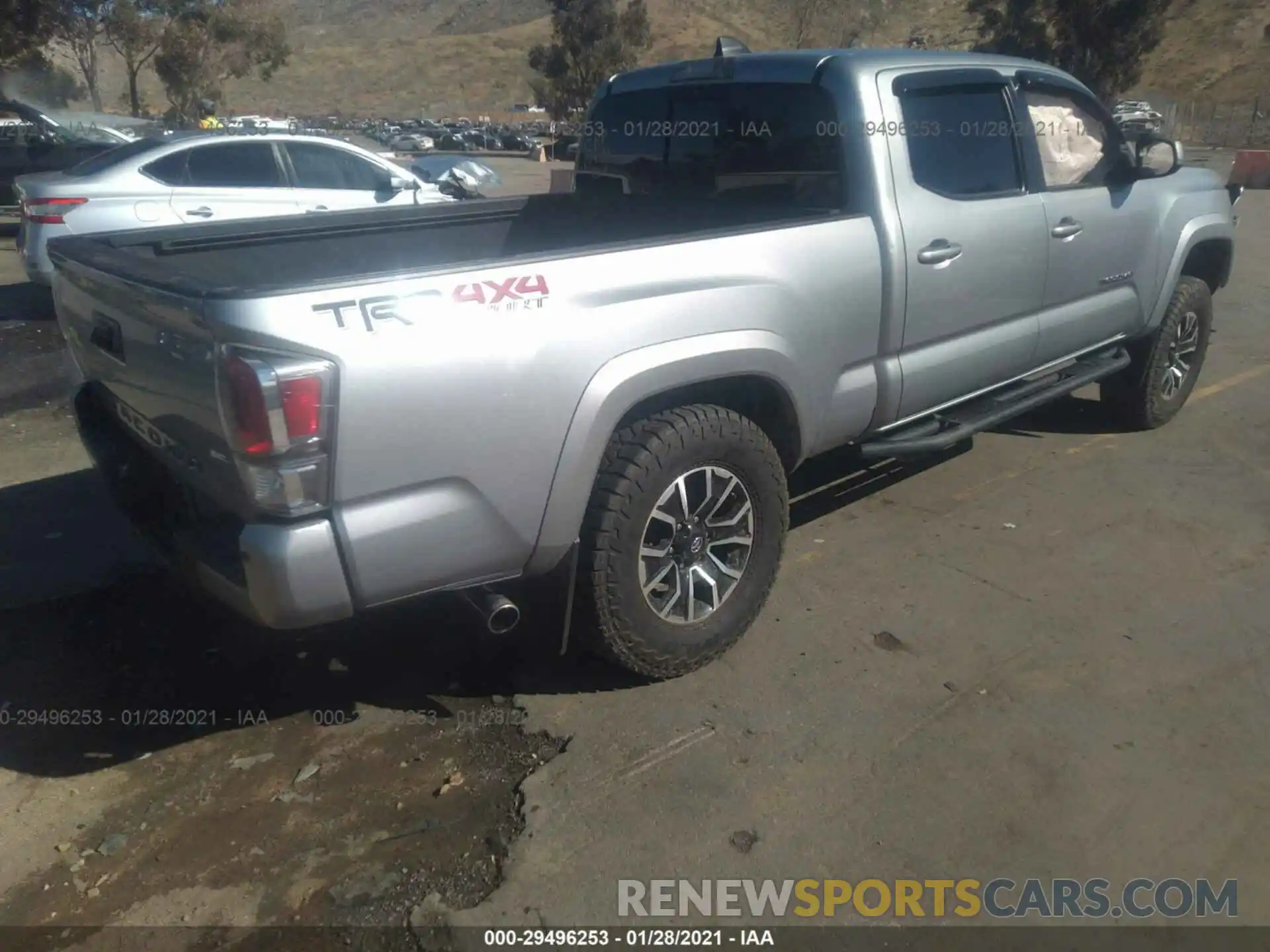 4 Photograph of a damaged car 3TMDZ5BN5LM081141 TOYOTA TACOMA 4WD 2020