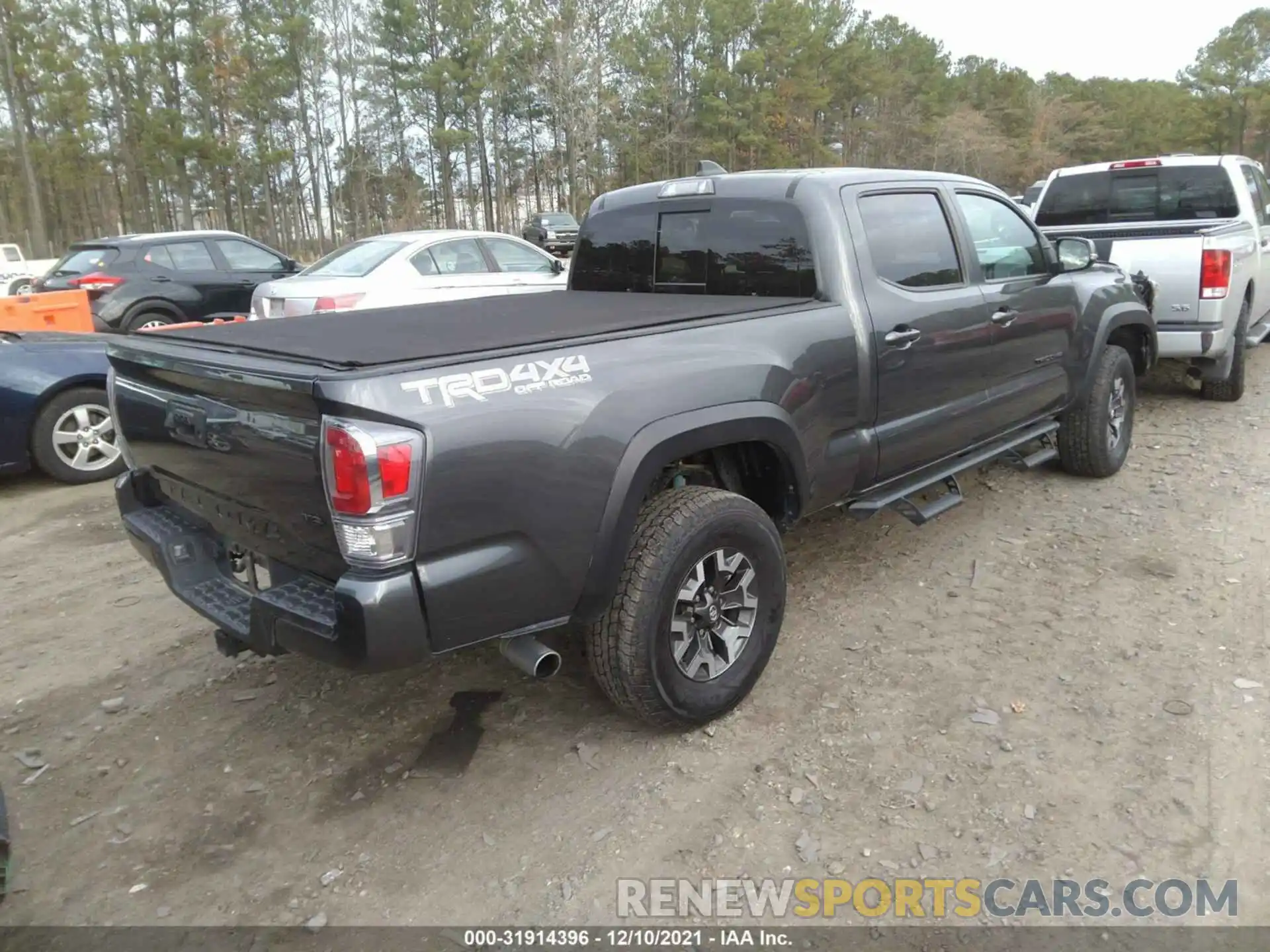 4 Photograph of a damaged car 3TMDZ5BN5LM081902 TOYOTA TACOMA 4WD 2020