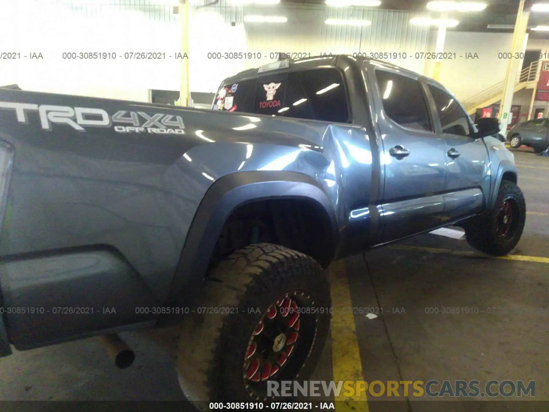 4 Photograph of a damaged car 3TMDZ5BN5LM092933 TOYOTA TACOMA 4WD 2020