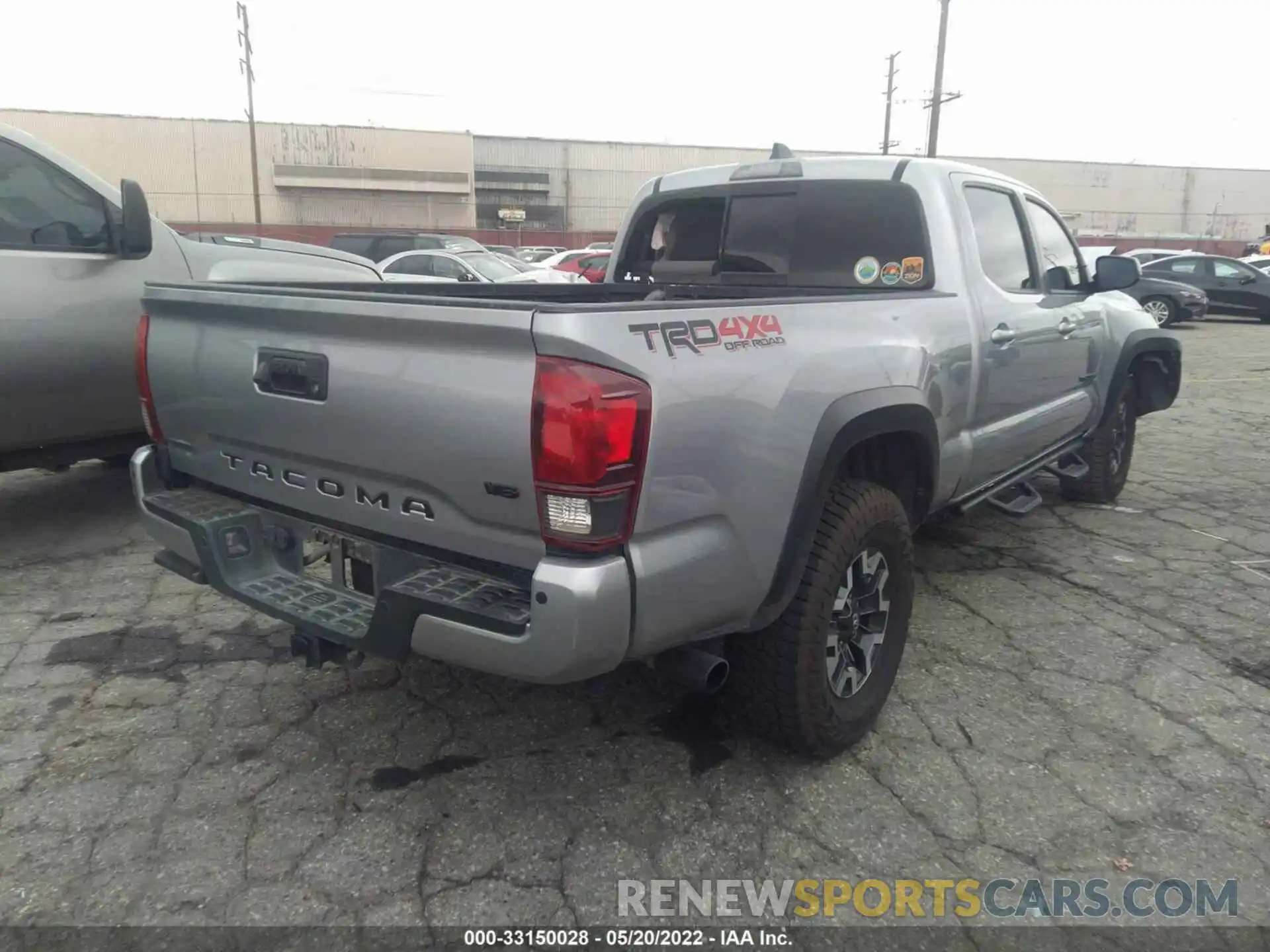 4 Photograph of a damaged car 3TMDZ5BN5LM095766 TOYOTA TACOMA 4WD 2020