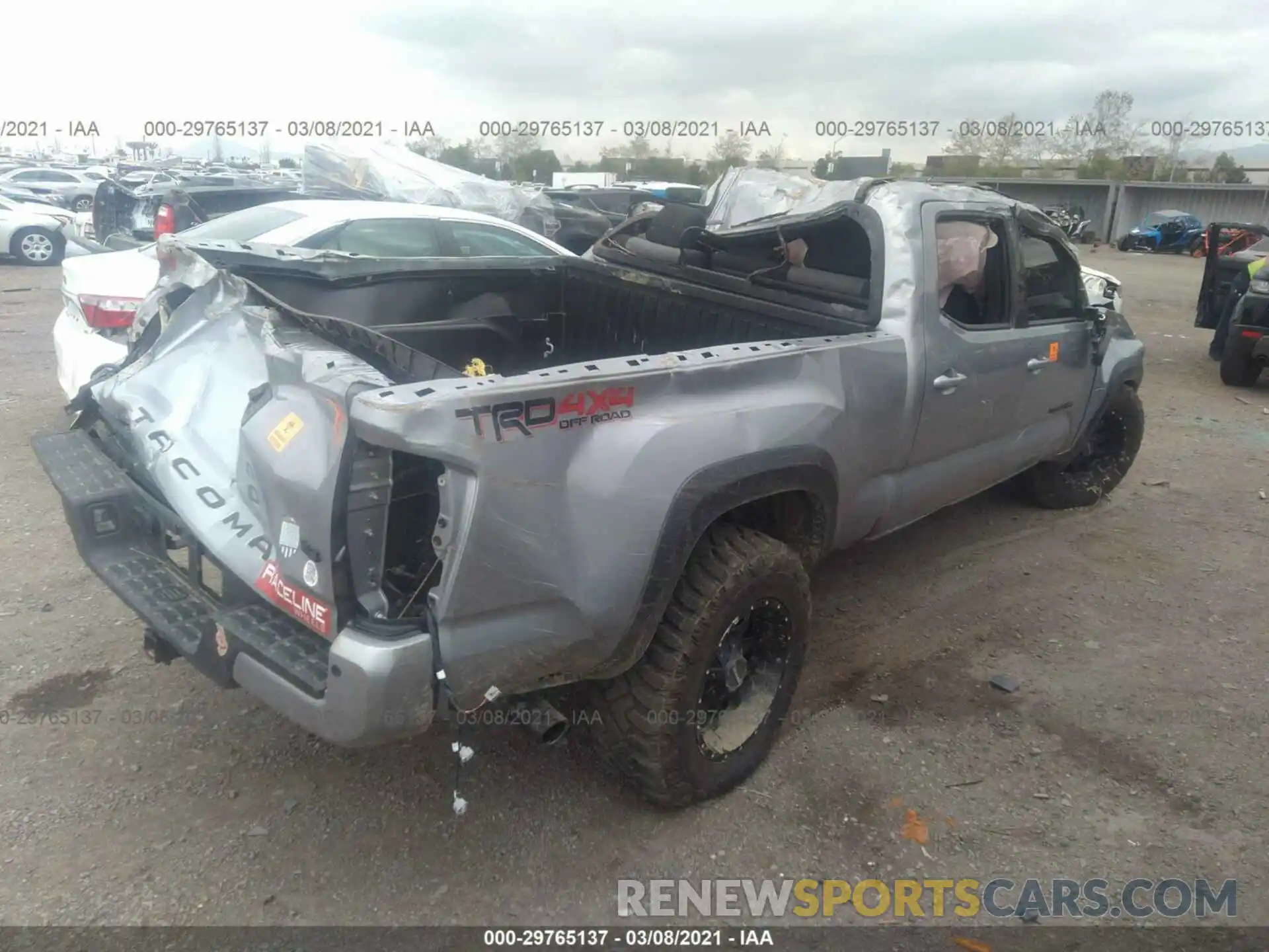 4 Photograph of a damaged car 3TMDZ5BN6LM098580 TOYOTA TACOMA 4WD 2020