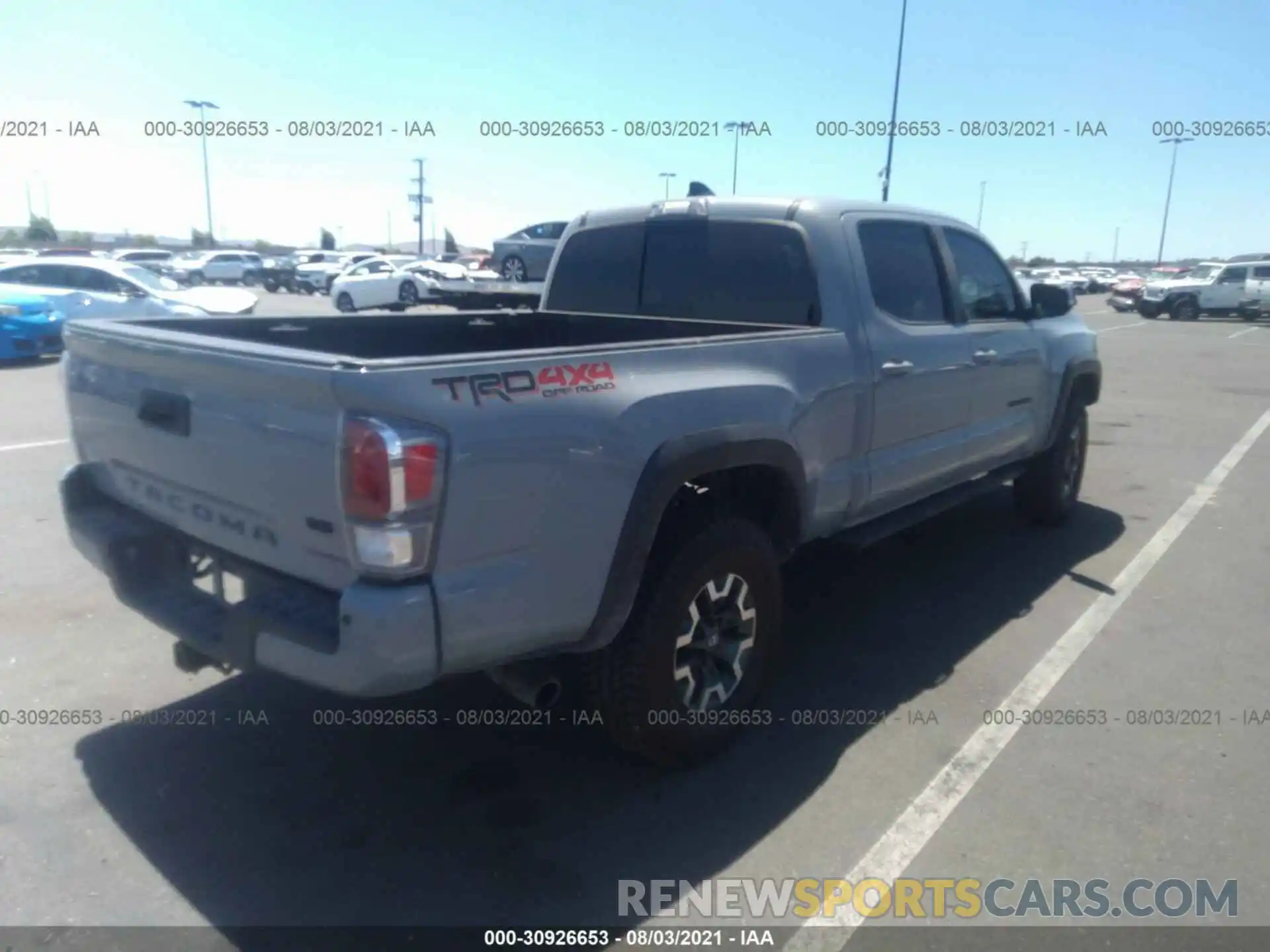 4 Photograph of a damaged car 3TMDZ5BN8LM083871 TOYOTA TACOMA 4WD 2020